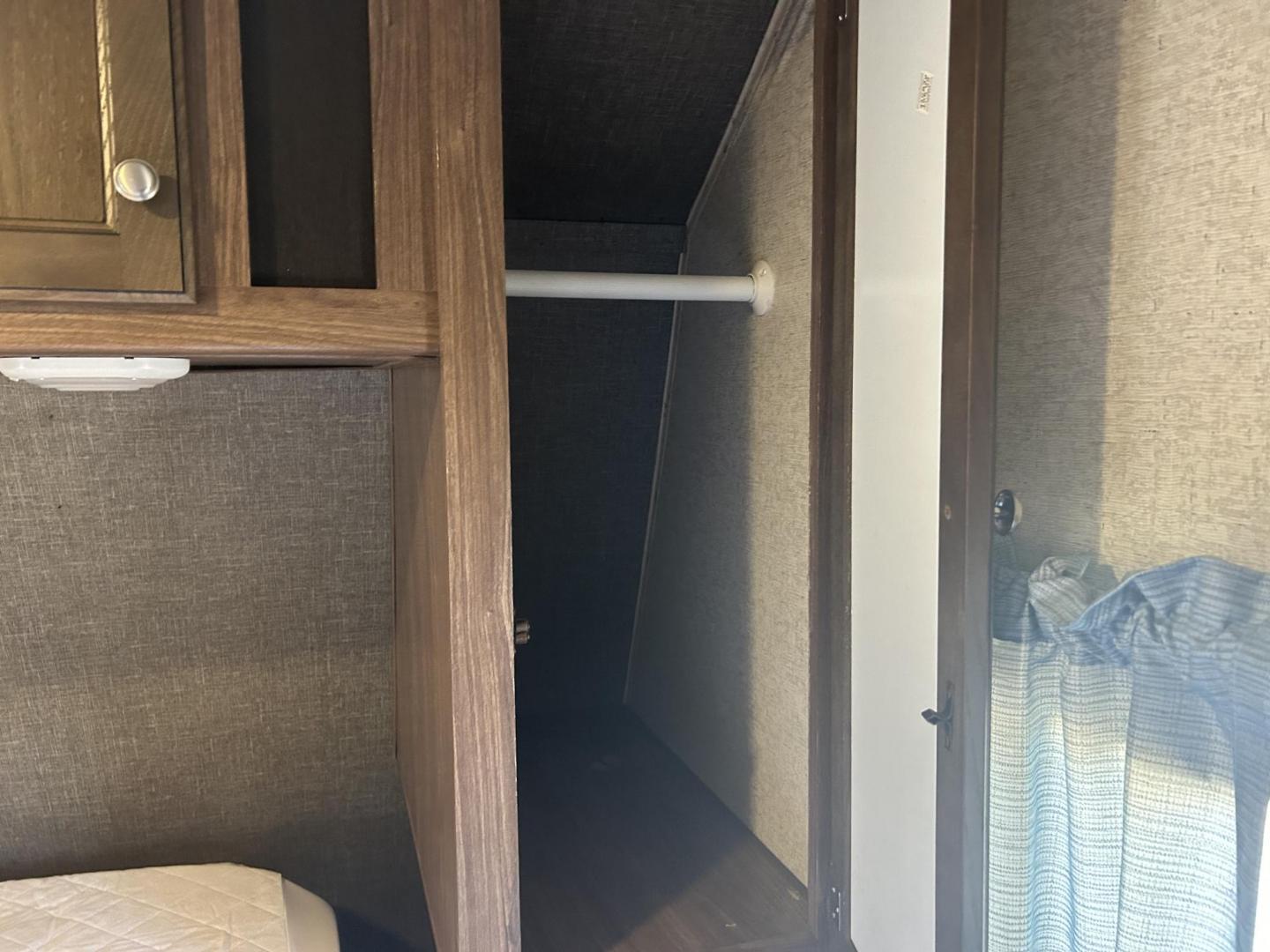 2017 White /TAN HEARTLAND TRAIL RUNNER TOY HAULER 26TH (5SFEB3027HE) , located at 17760 Hwy 62, Morris, OK, 74445, 35.609104, -95.877060 - WE HAVE THE PERFECT CAMPER FOR YOU TO CAMP AND HAUL YOUR TOYS IN. THIS IS A 2017 HEARTLAND TRAIL RUNNER OVERALL 30FT. IT FEATURES 17FT POWER AWNING, POWER JACK STABILIZERS, AMFM BLUETOOTH RADIO. IN THE FRONT YOU HAVE A QUEEN SIZED BED WITH STORAGE UNDERNEATH, OVERHEAD STORAGE, 2 WARDROBE CLOSETS, CO - Photo#25