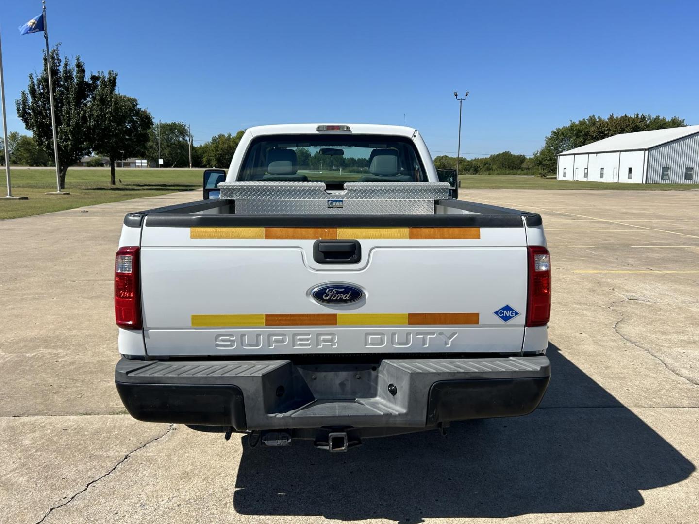 2013 White /Gray Ford F-250 SD XL (1FTBF2A65DE) with an 6.2L V8 OHV 16V engine, 6-Speed Automatic transmission, located at 17760 Hwy 62, Morris, OK, 74445, (918) 733-4887, 35.609104, -95.877060 - 2013 F250 SUPER DUTY IS A DEDICATED CNG ONLY RUNS ON COMPRESSED NATURAL GAS. THIS TRUCK HAS A 6.2L V8 ENGINE, FEATURES MANUAL SEAT, MANUAL WINDOWS, MANUAL LOCKS, MANUAL MIRRORS, LEATHER INTERIOR, AM FM RADIO, TRACTION CONTROL, CRUSIE CONTROL, TRAILER HITCH, FACTORY BUILT IN TRAILER BRAKES, TOOL BOX - Photo#5