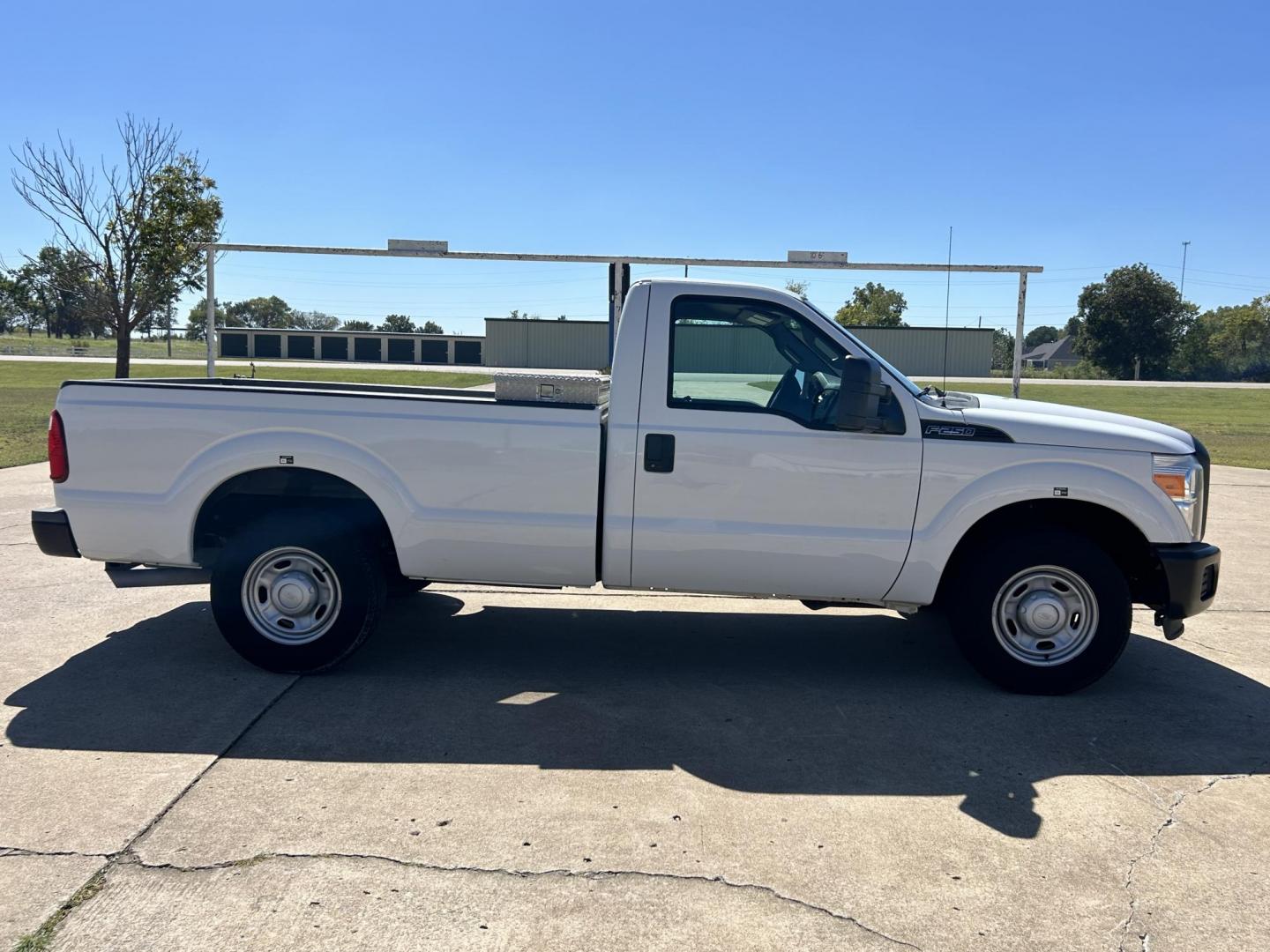 2013 White /Gray Ford F-250 SD XL (1FTBF2A65DE) with an 6.2L V8 OHV 16V engine, 6-Speed Automatic transmission, located at 17760 Hwy 62, Morris, OK, 74445, (918) 733-4887, 35.609104, -95.877060 - 2013 F250 SUPER DUTY IS A DEDICATED CNG ONLY RUNS ON COMPRESSED NATURAL GAS. THIS TRUCK HAS A 6.2L V8 ENGINE, FEATURES MANUAL SEAT, MANUAL WINDOWS, MANUAL LOCKS, MANUAL MIRRORS, LEATHER INTERIOR, AM FM RADIO, TRACTION CONTROL, CRUSIE CONTROL, TRAILER HITCH, FACTORY BUILT IN TRAILER BRAKES, TOOL BOX - Photo#4