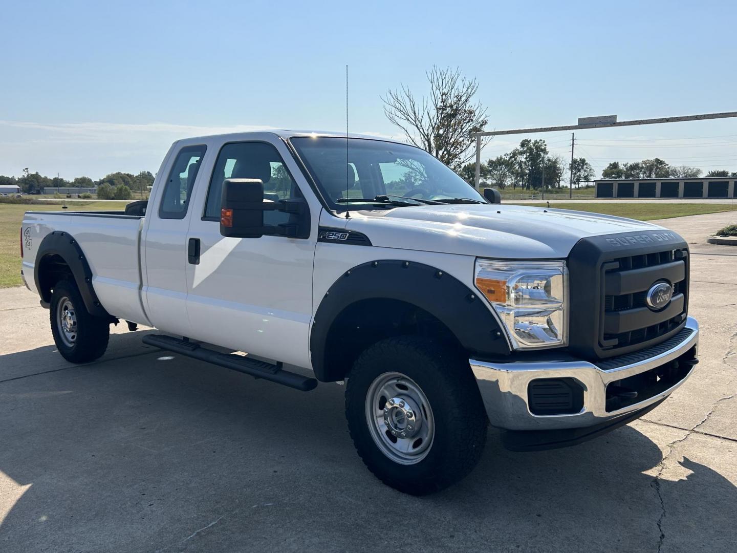 2014 White /Gray Ford F-250 SD XLT SuperCab Long Bed 4WD (1FT7X2B6XEE) with an 6.2L V8 OHV 16V engine, 6-Speed Automatic transmission, located at 17760 Hwy 62, Morris, OK, 74445, (918) 733-4887, 35.609104, -95.877060 - Photo#2