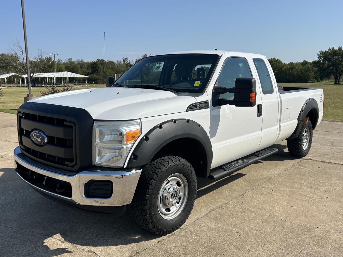 2014 White /Gray Ford F-250 SD XLT SuperCab Long Bed 4WD (1FT7X2B6XEE) with an 6.2L V8 OHV 16V engine, 6-Speed Automatic transmission, located at 17760 Hwy 62, Morris, OK, 74445, (918) 733-4887, 35.609104, -95.877060 - Photo#0