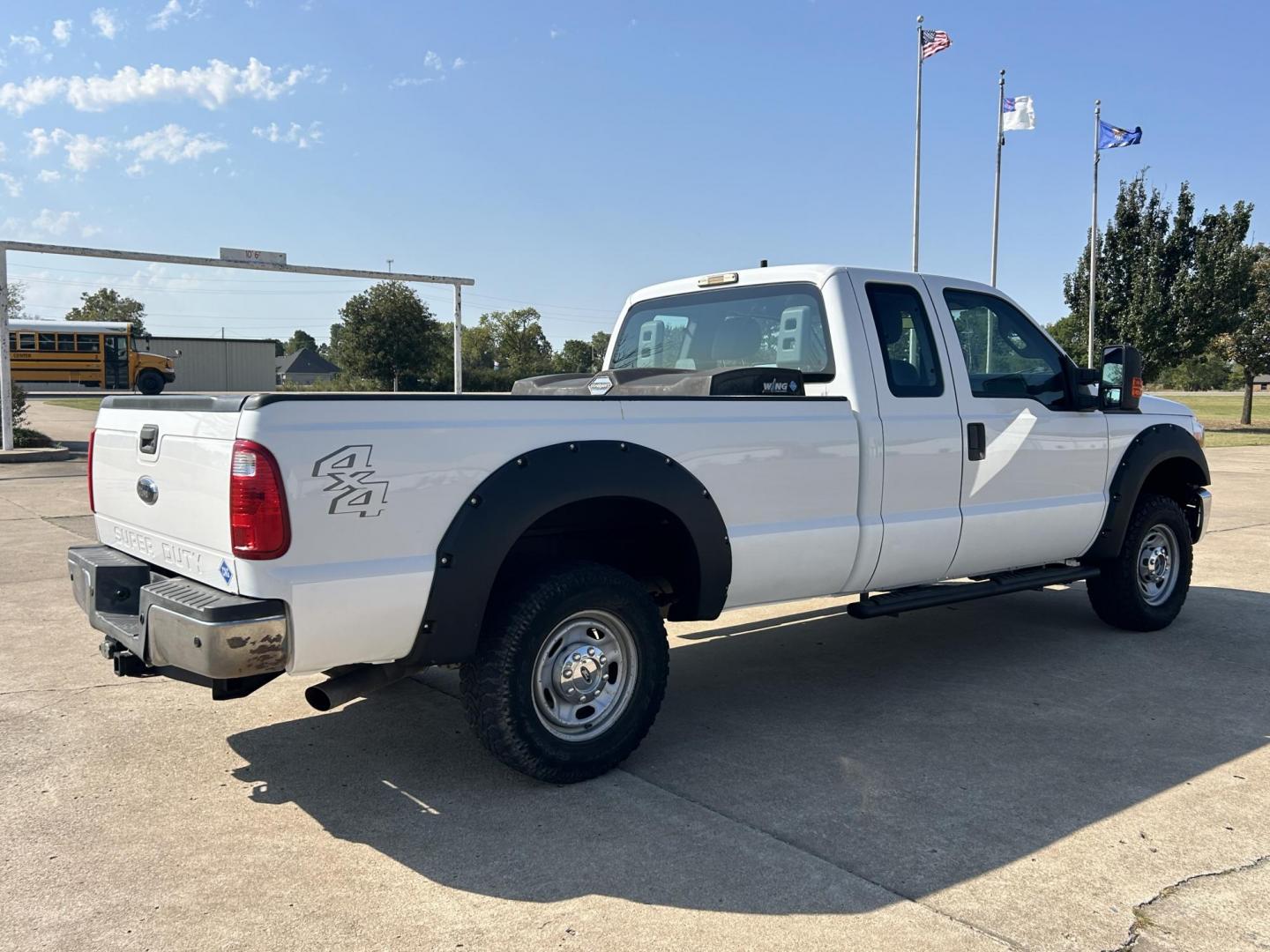 2014 White /Gray Ford F-250 SD XLT SuperCab Long Bed 4WD (1FT7X2B6XEE) with an 6.2L V8 OHV 16V engine, 6-Speed Automatic transmission, located at 17760 Hwy 62, Morris, OK, 74445, (918) 733-4887, 35.609104, -95.877060 - Photo#4