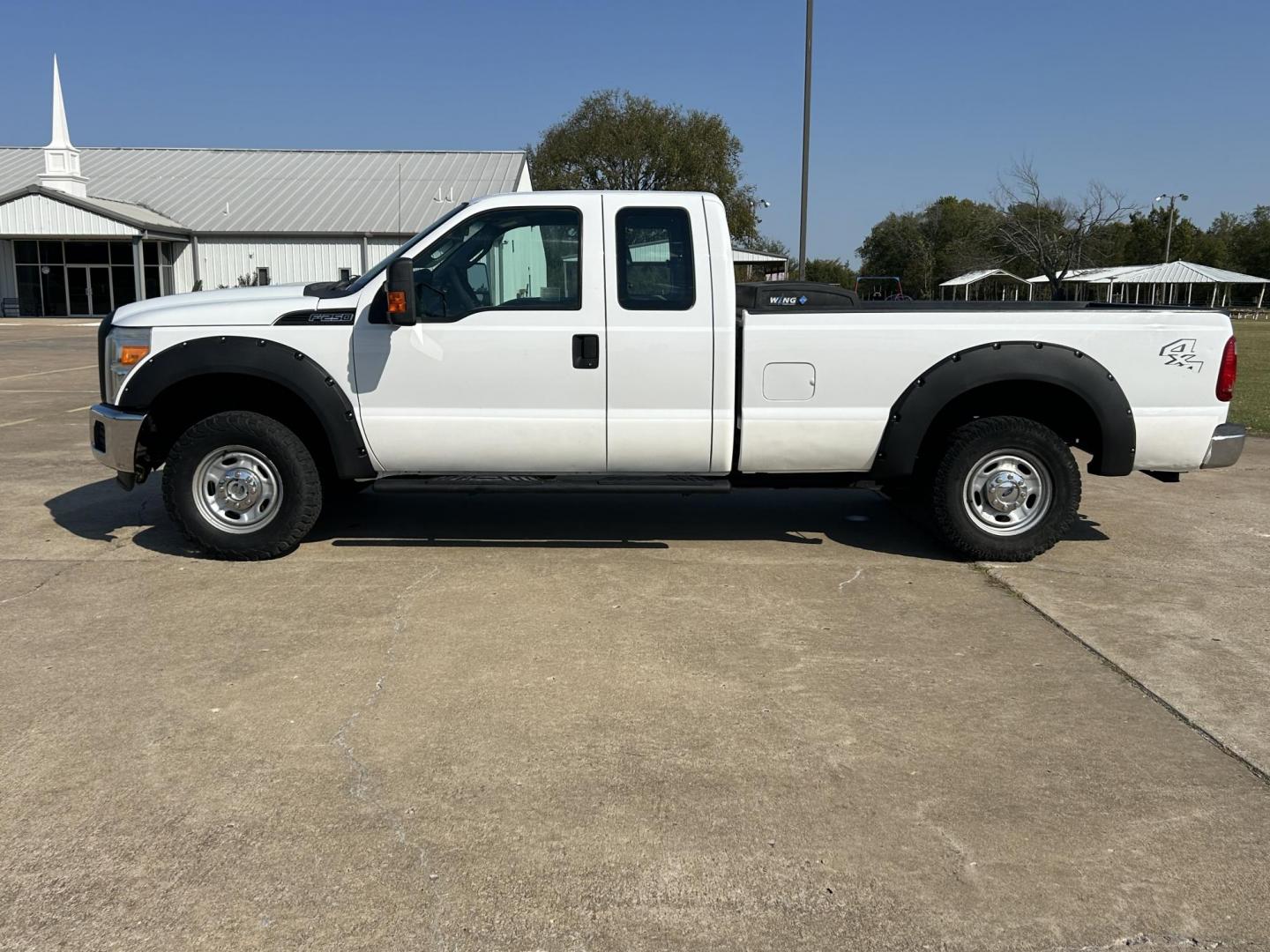 2014 White /Gray Ford F-250 SD XLT SuperCab Long Bed 4WD (1FT7X2B6XEE) with an 6.2L V8 OHV 16V engine, 6-Speed Automatic transmission, located at 17760 Hwy 62, Morris, OK, 74445, (918) 733-4887, 35.609104, -95.877060 - Photo#7