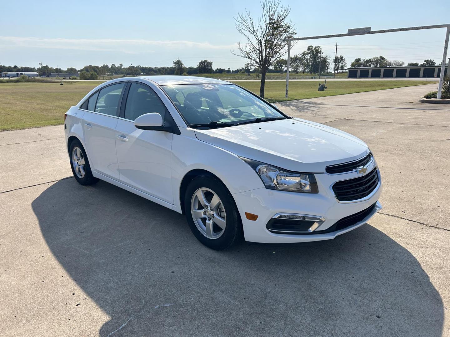 2015 White /Gray Chevrolet Cruze 1LT Auto (1G1PC5SB7F7) with an 1.4L L4 DOHC 16V TURBO engine, 6-Speed Automatic transmission, located at 17760 Hwy 62, Morris, OK, 74445, (918) 733-4887, 35.609104, -95.877060 - 2015 CHEVROLET CRUZE 1.4L L4 DOHC 16V TURBO FFV FWD, A BI-FUEL SYSTEM THAT RUNS ON CNG (COMPRESSED NATURAL GAS) OR GASOLINE. GREAT FOR YOUR EVERYDAY COMMUTE 42 MPG!!!!! THE CHEVROLET CRUZE FEATURES POWER LOCKS, POWER WINDOWS, POWER MIRRORS, MANUAL SEATS, CLOTH SEATS, AM/FM RADIO, CD PLAYER, ON STAR - Photo#1