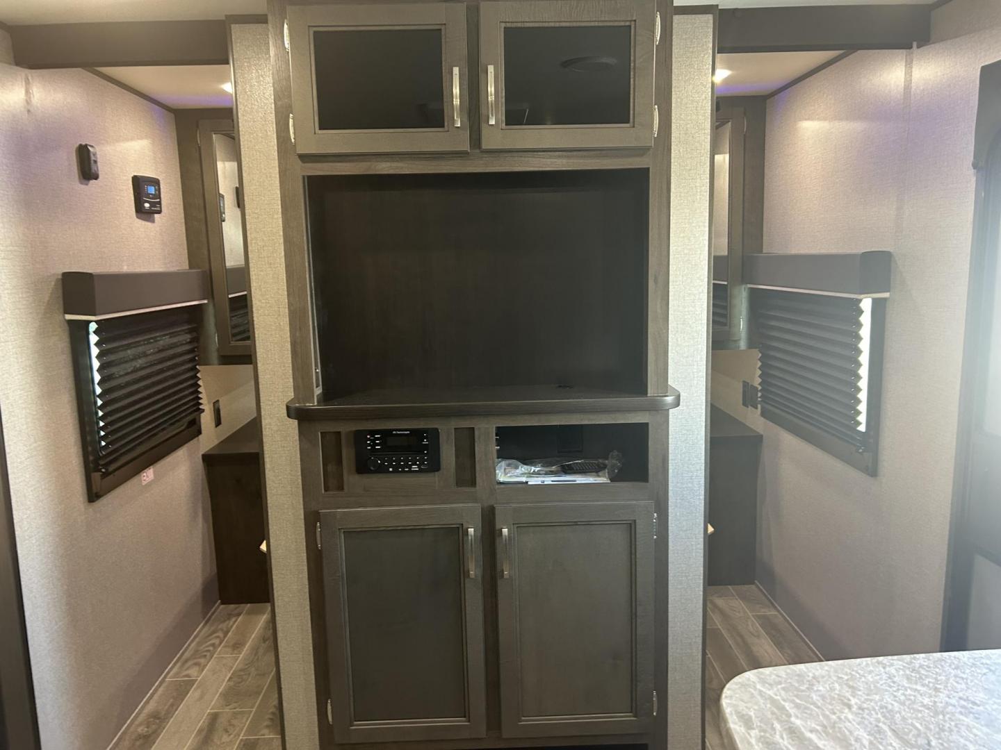 2021 Silver /Gray JAYCO JAY FLIGHT 267BHS (1UJBJ0BP5M1) , located at 17760 Hwy 62, Morris, OK, 74445, 35.609104, -95.877060 - WE HAVE A NICE FAMILY FRIENDLY CAMPER FOR YOU! IT'S PERFECT FOR A LAKE WEEKEND OR HUNTING TRIPS! THIS 2021 JAYCO JAY FLIGHT IS 30FT OVERALL. IN THE FRONT OF THE CAMPER YOU HAVE YOUR BEDROOM WITH QUEEN SIZE BED, OVERHEAD STORAGE WITH BLUE LED LIGHTS, STORAGE UNDERNEATH BED, 2 WARDROBE CLOSETS, IN THE - Photo#16