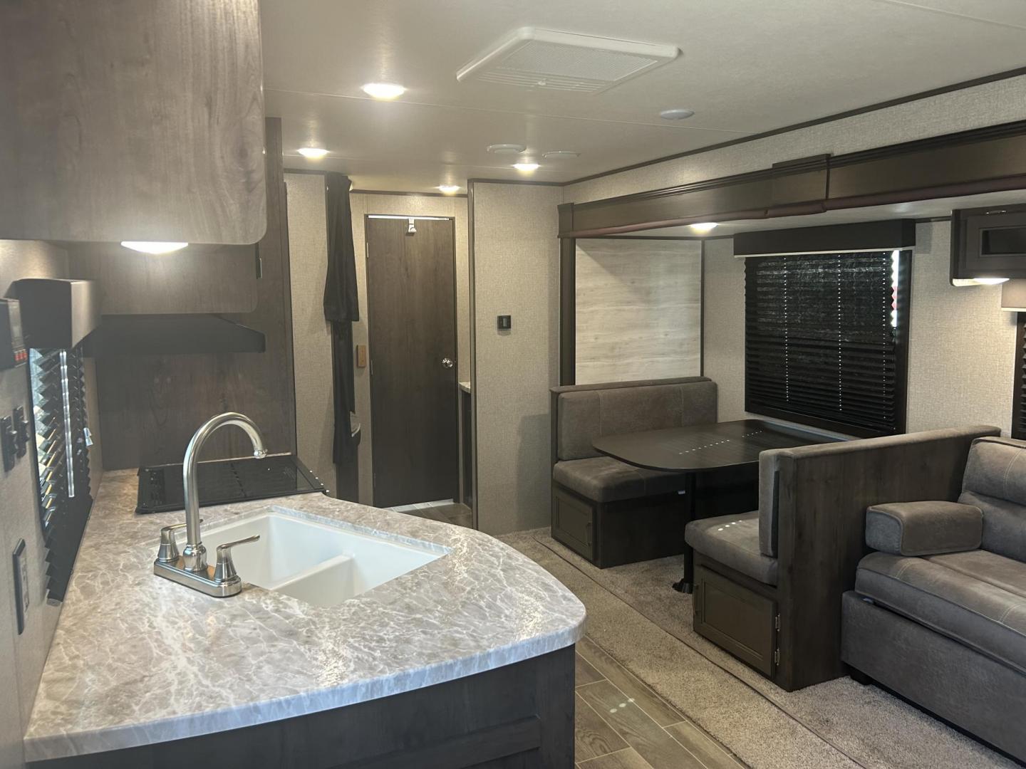 2021 Silver /Gray JAYCO JAY FLIGHT 267BHS (1UJBJ0BP5M1) , located at 17760 Hwy 62, Morris, OK, 74445, 35.609104, -95.877060 - WE HAVE A NICE FAMILY FRIENDLY CAMPER FOR YOU! IT'S PERFECT FOR A LAKE WEEKEND OR HUNTING TRIPS! THIS 2021 JAYCO JAY FLIGHT IS 30FT OVERALL. IN THE FRONT OF THE CAMPER YOU HAVE YOUR BEDROOM WITH QUEEN SIZE BED, OVERHEAD STORAGE WITH BLUE LED LIGHTS, STORAGE UNDERNEATH BED, 2 WARDROBE CLOSETS, IN THE - Photo#8