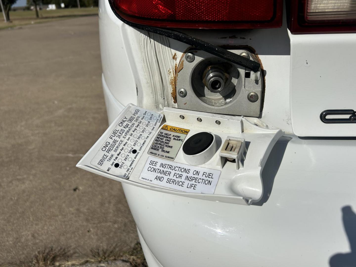 1999 White /BLACK Chevrolet Cavalier Sedan (3G1JC5240XS) with an 2.2L L4 OHV 8V engine, located at 17760 Hwy 62, Morris, OK, 74445, (918) 733-4887, 35.609104, -95.877060 - 1999 CHEVY CAVALIER HAS THE 2.2L L4 OHV 8V ENGINE. THIS IS A BI-FUEL SYSTEM THAT RUNS ON CNG OR GASOLINE. IT FEATURES AM/FM RADIO, MANUAL SEATS, MANUAL LOCKS, MANUAL WINDOWS, AND CLOTH INTERIOR. EQUIPPED WITH A IMPCO BI-FUEL CNG FUEL SYSTEM. IT RUNS ON COMPRESSED NATURAL GAS OR GASOLINE. A PREMIER A - Photo#14