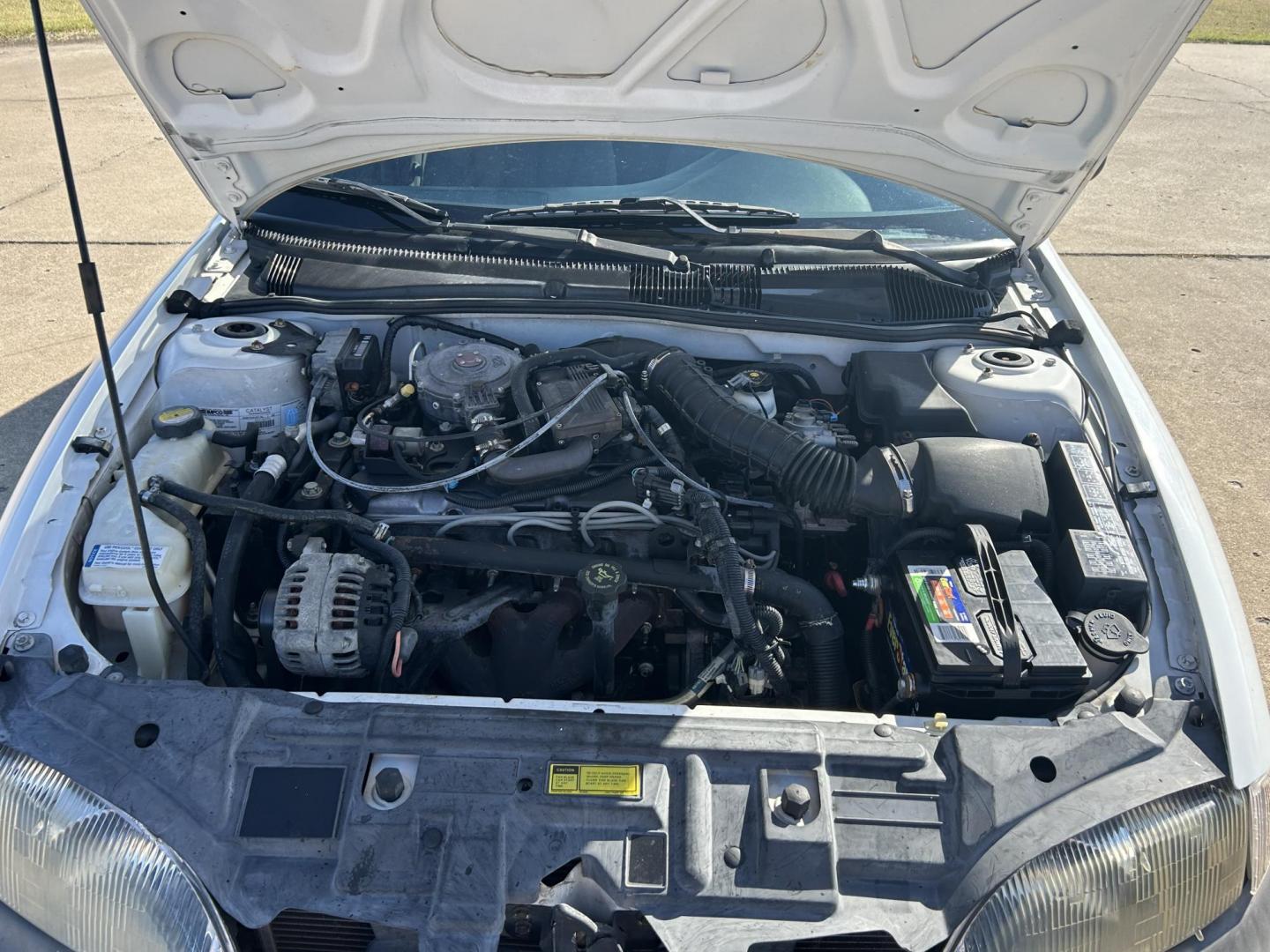 1999 White /BLACK Chevrolet Cavalier Sedan (3G1JC5240XS) with an 2.2L L4 OHV 8V engine, located at 17760 Hwy 62, Morris, OK, 74445, (918) 733-4887, 35.609104, -95.877060 - 1999 CHEVY CAVALIER HAS THE 2.2L L4 OHV 8V ENGINE. THIS IS A BI-FUEL SYSTEM THAT RUNS ON CNG OR GASOLINE. IT FEATURES AM/FM RADIO, MANUAL SEATS, MANUAL LOCKS, MANUAL WINDOWS, AND CLOTH INTERIOR. EQUIPPED WITH A IMPCO BI-FUEL CNG FUEL SYSTEM. IT RUNS ON COMPRESSED NATURAL GAS OR GASOLINE. A PREMIER A - Photo#15