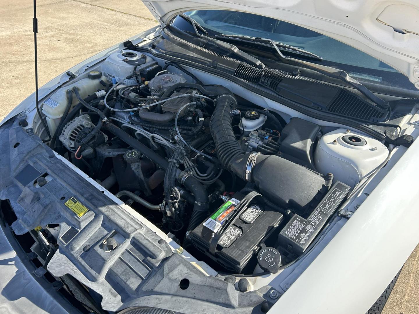 1999 White /BLACK Chevrolet Cavalier Sedan (3G1JC5240XS) with an 2.2L L4 OHV 8V engine, located at 17760 Hwy 62, Morris, OK, 74445, (918) 733-4887, 35.609104, -95.877060 - 1999 CHEVY CAVALIER HAS THE 2.2L L4 OHV 8V ENGINE. THIS IS A BI-FUEL SYSTEM THAT RUNS ON CNG OR GASOLINE. IT FEATURES AM/FM RADIO, MANUAL SEATS, MANUAL LOCKS, MANUAL WINDOWS, AND CLOTH INTERIOR. EQUIPPED WITH A IMPCO BI-FUEL CNG FUEL SYSTEM. IT RUNS ON COMPRESSED NATURAL GAS OR GASOLINE. A PREMIER A - Photo#16