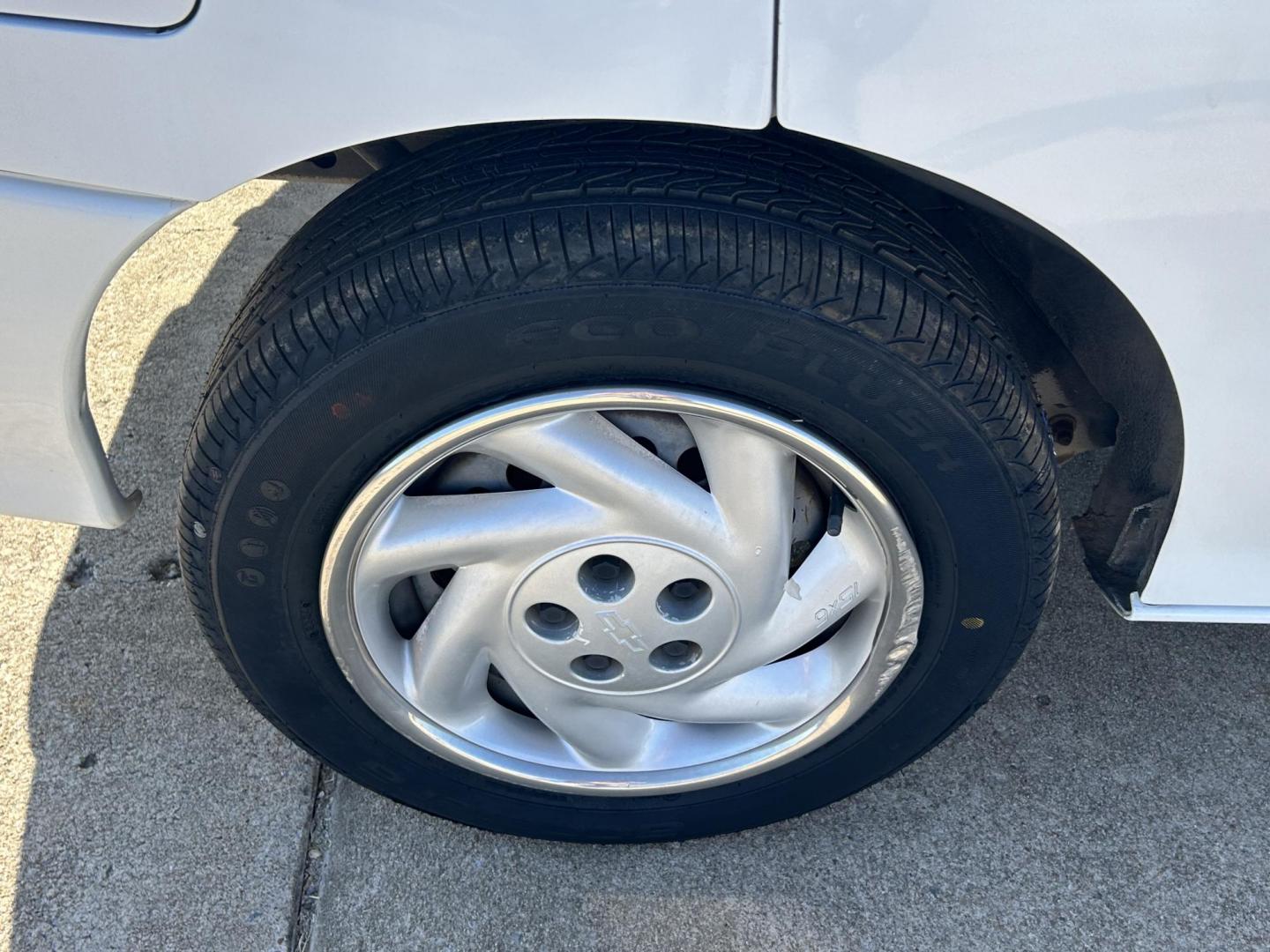 1999 White /BLACK Chevrolet Cavalier Sedan (3G1JC5240XS) with an 2.2L L4 OHV 8V engine, located at 17760 Hwy 62, Morris, OK, 74445, (918) 733-4887, 35.609104, -95.877060 - 1999 CHEVY CAVALIER HAS THE 2.2L L4 OHV 8V ENGINE. THIS IS A BI-FUEL SYSTEM THAT RUNS ON CNG OR GASOLINE. IT FEATURES AM/FM RADIO, MANUAL SEATS, MANUAL LOCKS, MANUAL WINDOWS, AND CLOTH INTERIOR. EQUIPPED WITH A IMPCO BI-FUEL CNG FUEL SYSTEM. IT RUNS ON COMPRESSED NATURAL GAS OR GASOLINE. A PREMIER A - Photo#20