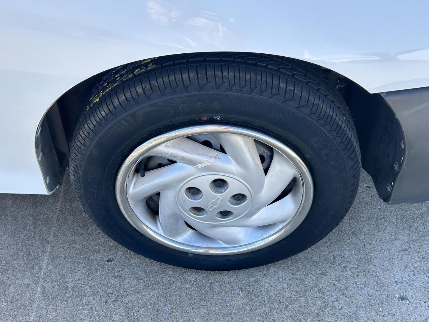 1999 White /BLACK Chevrolet Cavalier Sedan (3G1JC5240XS) with an 2.2L L4 OHV 8V engine, located at 17760 Hwy 62, Morris, OK, 74445, (918) 733-4887, 35.609104, -95.877060 - 1999 CHEVY CAVALIER HAS THE 2.2L L4 OHV 8V ENGINE. THIS IS A BI-FUEL SYSTEM THAT RUNS ON CNG OR GASOLINE. IT FEATURES AM/FM RADIO, MANUAL SEATS, MANUAL LOCKS, MANUAL WINDOWS, AND CLOTH INTERIOR. EQUIPPED WITH A IMPCO BI-FUEL CNG FUEL SYSTEM. IT RUNS ON COMPRESSED NATURAL GAS OR GASOLINE. A PREMIER A - Photo#21