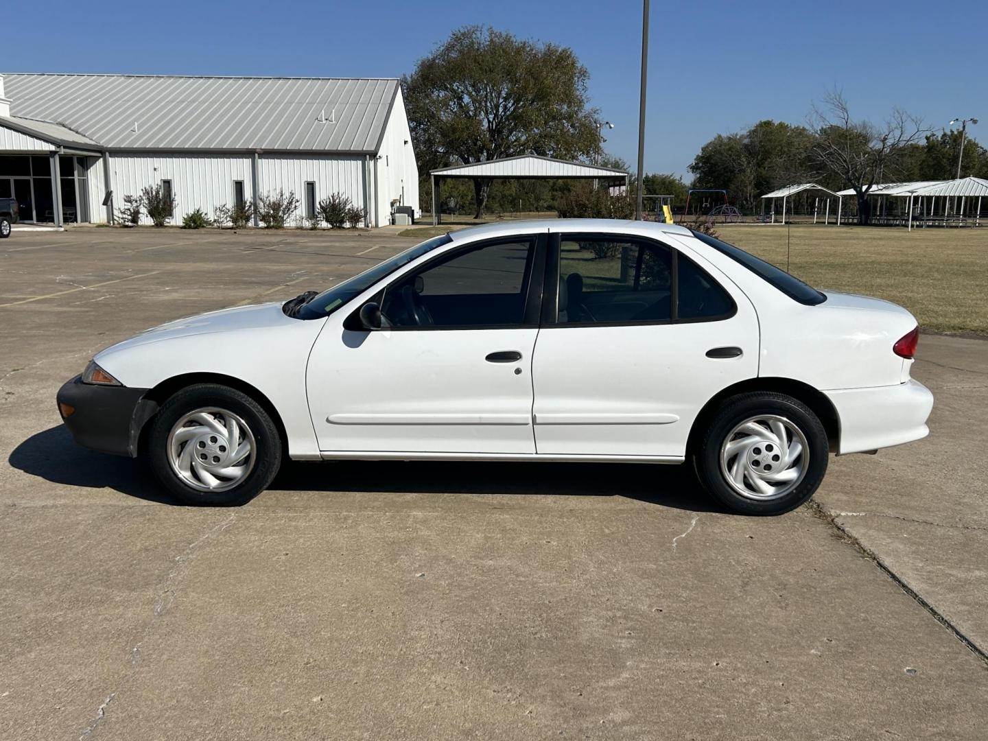 1999 White /BLACK Chevrolet Cavalier Sedan (3G1JC5240XS) with an 2.2L L4 OHV 8V engine, located at 17760 Hwy 62, Morris, OK, 74445, (918) 733-4887, 35.609104, -95.877060 - 1999 CHEVY CAVALIER HAS THE 2.2L L4 OHV 8V ENGINE. THIS IS A BI-FUEL SYSTEM THAT RUNS ON CNG OR GASOLINE. IT FEATURES AM/FM RADIO, MANUAL SEATS, MANUAL LOCKS, MANUAL WINDOWS, AND CLOTH INTERIOR. EQUIPPED WITH A IMPCO BI-FUEL CNG FUEL SYSTEM. IT RUNS ON COMPRESSED NATURAL GAS OR GASOLINE. A PREMIER A - Photo#7