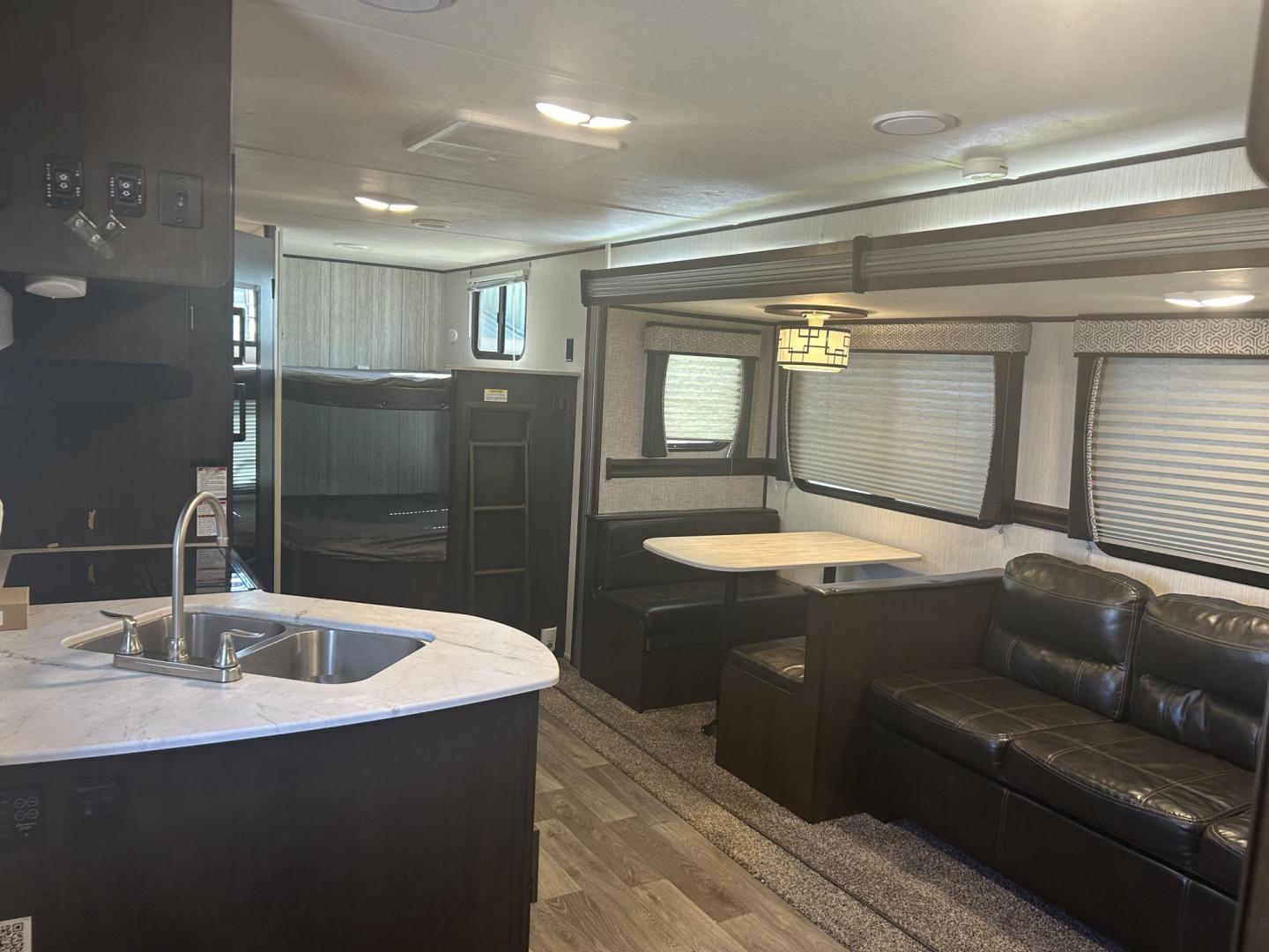 2021 Silver /TAN Breckenridge PIONEER BH270 (5SFPB3222ME) , located at 17760 Hwy 62, Morris, OK, 74445, 35.609104, -95.877060 - THIS IS THE PERFECT FAMILY FRIENDLY CAMPER FOR YOU! THIS 2021 BRECKENRIDGE PIONEER IS 32FT OVERALL WITH A 14FT POWER AWNING. IN THE FRONT YOU HAVE YOUR MASTER BEDROOM WITH QUEEN SIZE BED, OVERHEAD STORAGE AND STORAGE UNDER THE BED, 2 WARDROBE CLOSETS, IN THE MIDDLE IS YOUR LIVING / KITCHEN AREA, ENT - Photo#13