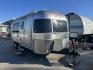 2005 Silver Airstream INTERNATIONAL 25CCD 25CCD (1STBFAF235J) , located at 17760 Hwy 62, Morris, OK, 74445, 35.609104, -95.877060 - LET THE ADVENTURES BEGIN WITH THIS 2005 22FT AIRSTREAM INTERNATIONAL. IN THE FRONT IS THE BEDROOM WITH A FULL SIZE BED AND STORAGE UNDER THE BED, TV ON A MOUNT WITH DVD PLAYER, CLOSET/PANTRY, IN THE KITCHEN AND LIVING AREA IS A MINI FRIDGE, 3 BURNER STOVE (NO OVEN), MICROWAVE, STAINLESS STEEL SINK A - Photo#0