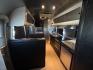 2005 Silver Airstream INTERNATIONAL 25CCD 25CCD (1STBFAF235J) , located at 17760 Hwy 62, Morris, OK, 74445, 35.609104, -95.877060 - LET THE ADVENTURES BEGIN WITH THIS 2005 22FT AIRSTREAM INTERNATIONAL. IN THE FRONT IS THE BEDROOM WITH A FULL SIZE BED AND STORAGE UNDER THE BED, TV ON A MOUNT WITH DVD PLAYER, CLOSET/PANTRY, IN THE KITCHEN AND LIVING AREA IS A MINI FRIDGE, 3 BURNER STOVE (NO OVEN), MICROWAVE, STAINLESS STEEL SINK A - Photo#13