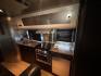 2005 Silver Airstream INTERNATIONAL 25CCD 25CCD (1STBFAF235J) , located at 17760 Hwy 62, Morris, OK, 74445, 35.609104, -95.877060 - LET THE ADVENTURES BEGIN WITH THIS 2005 22FT AIRSTREAM INTERNATIONAL. IN THE FRONT IS THE BEDROOM WITH A FULL SIZE BED AND STORAGE UNDER THE BED, TV ON A MOUNT WITH DVD PLAYER, CLOSET/PANTRY, IN THE KITCHEN AND LIVING AREA IS A MINI FRIDGE, 3 BURNER STOVE (NO OVEN), MICROWAVE, STAINLESS STEEL SINK A - Photo#14