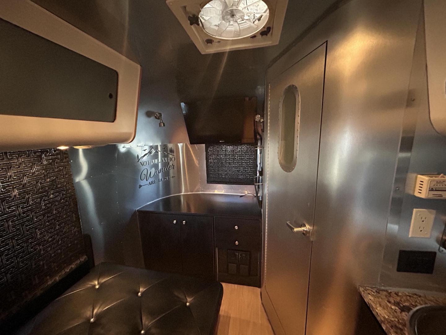 2005 Silver Airstream INTERNATIONAL 25CCD 25CCD (1STBFAF235J) , located at 17760 Hwy 62, Morris, OK, 74445, 35.609104, -95.877060 - LET THE ADVENTURES BEGIN WITH THIS 2005 22FT AIRSTREAM INTERNATIONAL. IN THE FRONT IS THE BEDROOM WITH A FULL SIZE BED AND STORAGE UNDER THE BED, TV ON A MOUNT WITH DVD PLAYER, CLOSET/PANTRY, IN THE KITCHEN AND LIVING AREA IS A MINI FRIDGE, 3 BURNER STOVE (NO OVEN), MICROWAVE, STAINLESS STEEL SINK A - Photo#19