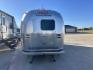 2005 Silver Airstream INTERNATIONAL 25CCD 25CCD (1STBFAF235J) , located at 17760 Hwy 62, Morris, OK, 74445, 35.609104, -95.877060 - LET THE ADVENTURES BEGIN WITH THIS 2005 22FT AIRSTREAM INTERNATIONAL. IN THE FRONT IS THE BEDROOM WITH A FULL SIZE BED AND STORAGE UNDER THE BED, TV ON A MOUNT WITH DVD PLAYER, CLOSET/PANTRY, IN THE KITCHEN AND LIVING AREA IS A MINI FRIDGE, 3 BURNER STOVE (NO OVEN), MICROWAVE, STAINLESS STEEL SINK A - Photo#3