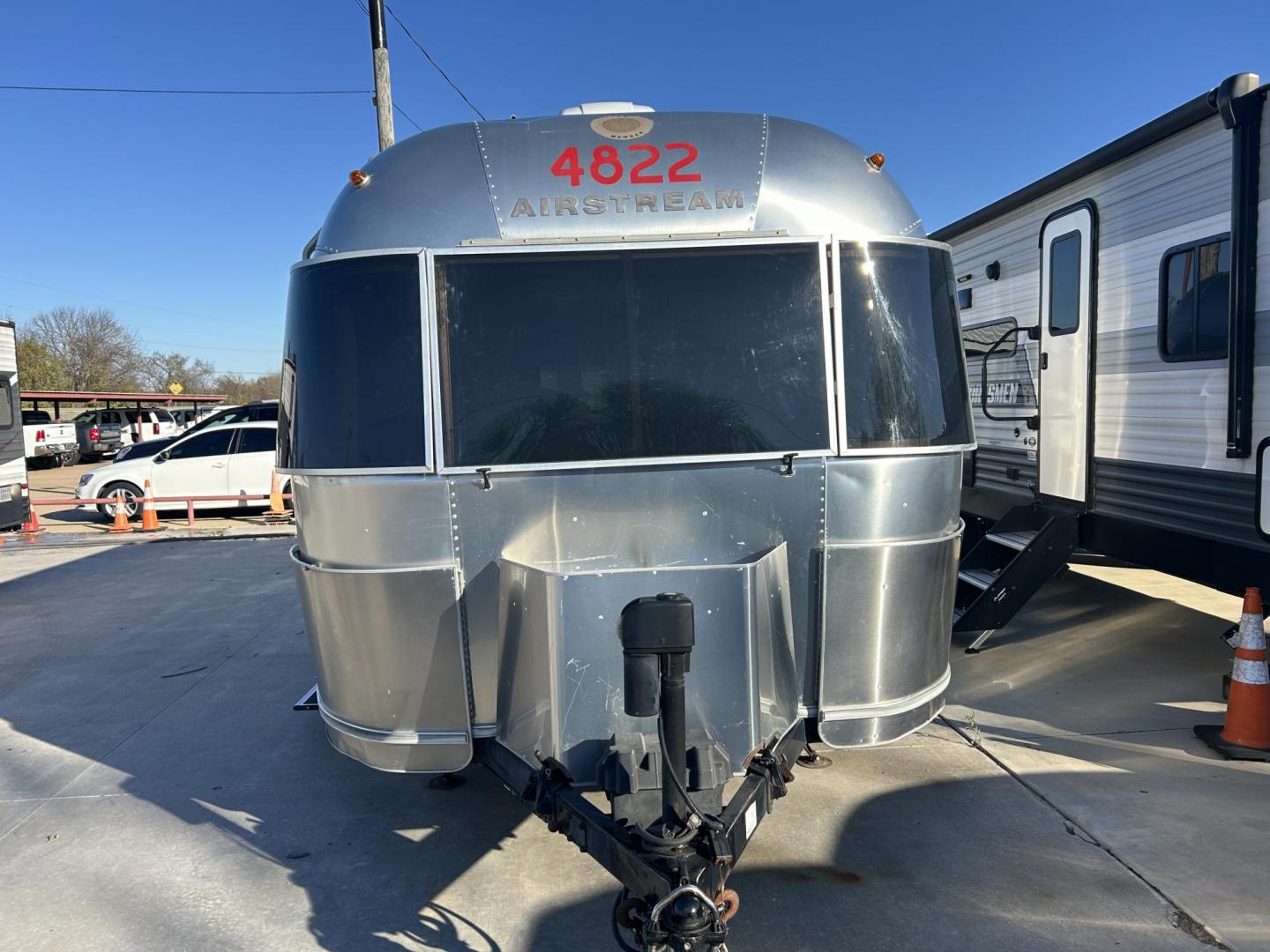 2005 Silver Airstream INTERNATIONAL 25CCD 25CCD (1STBFAF235J) , located at 17760 Hwy 62, Morris, OK, 74445, 35.609104, -95.877060 - LET THE ADVENTURES BEGIN WITH THIS 2005 22FT AIRSTREAM INTERNATIONAL. IN THE FRONT IS THE BEDROOM WITH A FULL SIZE BED AND STORAGE UNDER THE BED, TV ON A MOUNT WITH DVD PLAYER, CLOSET/PANTRY, IN THE KITCHEN AND LIVING AREA IS A MINI FRIDGE, 3 BURNER STOVE (NO OVEN), MICROWAVE, STAINLESS STEEL SINK A - Photo#6