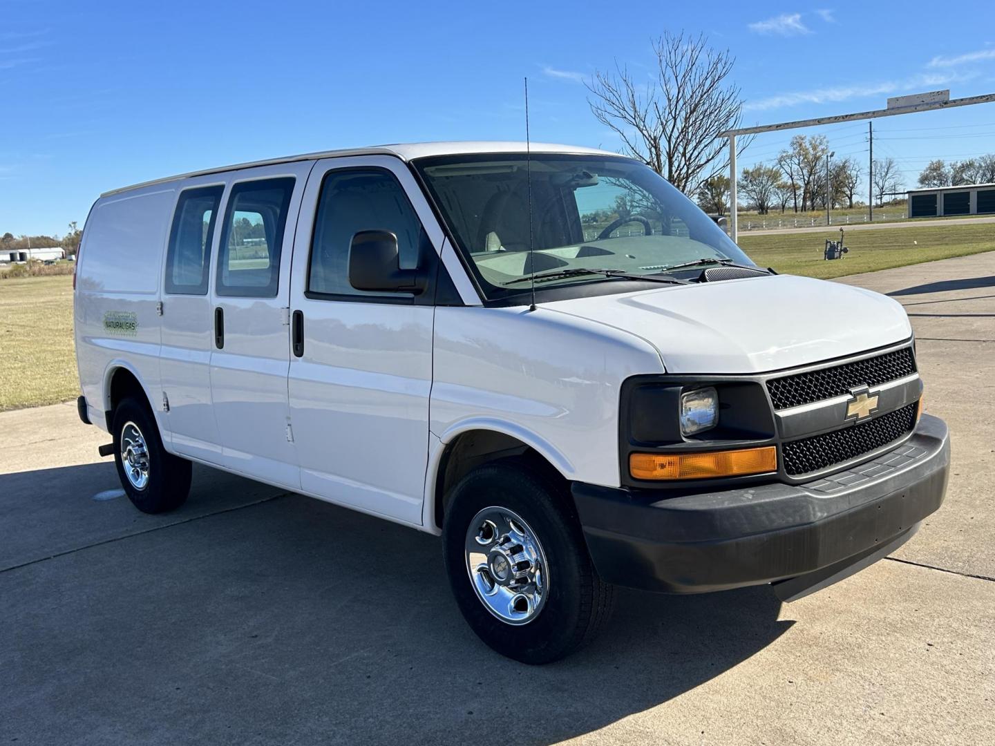 2014 White /BLACK Chevrolet Express 2500 Cargo (1GCWGFCB8E1) with an 6.0L V8 OHV 16V CNG engine, 6A transmission, located at 17760 Hwy 62, Morris, OK, 74445, (918) 733-4887, 35.609104, -95.877060 - 2014 CHEVROLET EXPRESS CARGO VAN 6.0L V8 RWD FEATURING POWER LOCKS, POWER WINDOWS, POWER MIRRORS, MANUAL SEATS, AM/FM STEREO, LEATHER SEATS, TRACTION CONTROL, SPLIT SWING-OUT RIGHT DOORS AND REAR DOORS, TRAILER HITCH AND TOW PACKAGE. EQUIPPED WITH A CNG FUEL SYSTEM THAT RUNS ON COMPRESSED NATURAL GA - Photo#2