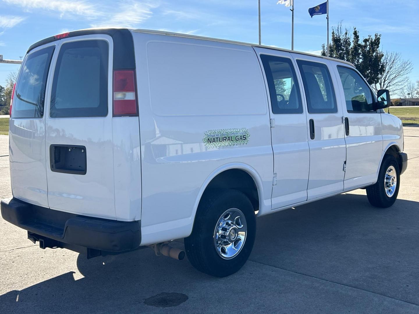 2014 White /BLACK Chevrolet Express 2500 Cargo (1GCWGFCB8E1) with an 6.0L V8 OHV 16V CNG engine, 6A transmission, located at 17760 Hwy 62, Morris, OK, 74445, (918) 733-4887, 35.609104, -95.877060 - 2014 CHEVROLET EXPRESS CARGO VAN 6.0L V8 RWD FEATURING POWER LOCKS, POWER WINDOWS, POWER MIRRORS, MANUAL SEATS, AM/FM STEREO, LEATHER SEATS, TRACTION CONTROL, SPLIT SWING-OUT RIGHT DOORS AND REAR DOORS, TRAILER HITCH AND TOW PACKAGE. EQUIPPED WITH A CNG FUEL SYSTEM THAT RUNS ON COMPRESSED NATURAL GA - Photo#4