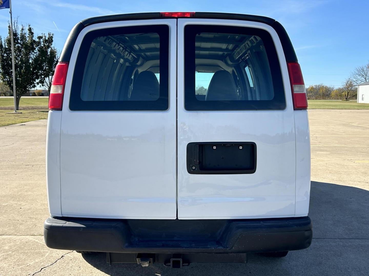 2014 White /BLACK Chevrolet Express 2500 Cargo (1GCWGFCB8E1) with an 6.0L V8 OHV 16V CNG engine, 6A transmission, located at 17760 Hwy 62, Morris, OK, 74445, (918) 733-4887, 35.609104, -95.877060 - 2014 CHEVROLET EXPRESS CARGO VAN 6.0L V8 RWD FEATURING POWER LOCKS, POWER WINDOWS, POWER MIRRORS, MANUAL SEATS, AM/FM STEREO, LEATHER SEATS, TRACTION CONTROL, SPLIT SWING-OUT RIGHT DOORS AND REAR DOORS, TRAILER HITCH AND TOW PACKAGE. EQUIPPED WITH A CNG FUEL SYSTEM THAT RUNS ON COMPRESSED NATURAL GA - Photo#5