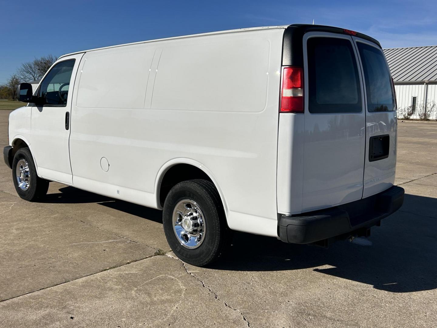 2014 White /BLACK Chevrolet Express 2500 Cargo (1GCWGFCB8E1) with an 6.0L V8 OHV 16V CNG engine, 6A transmission, located at 17760 Hwy 62, Morris, OK, 74445, (918) 733-4887, 35.609104, -95.877060 - 2014 CHEVROLET EXPRESS CARGO VAN 6.0L V8 RWD FEATURING POWER LOCKS, POWER WINDOWS, POWER MIRRORS, MANUAL SEATS, AM/FM STEREO, LEATHER SEATS, TRACTION CONTROL, SPLIT SWING-OUT RIGHT DOORS AND REAR DOORS, TRAILER HITCH AND TOW PACKAGE. EQUIPPED WITH A CNG FUEL SYSTEM THAT RUNS ON COMPRESSED NATURAL GA - Photo#6