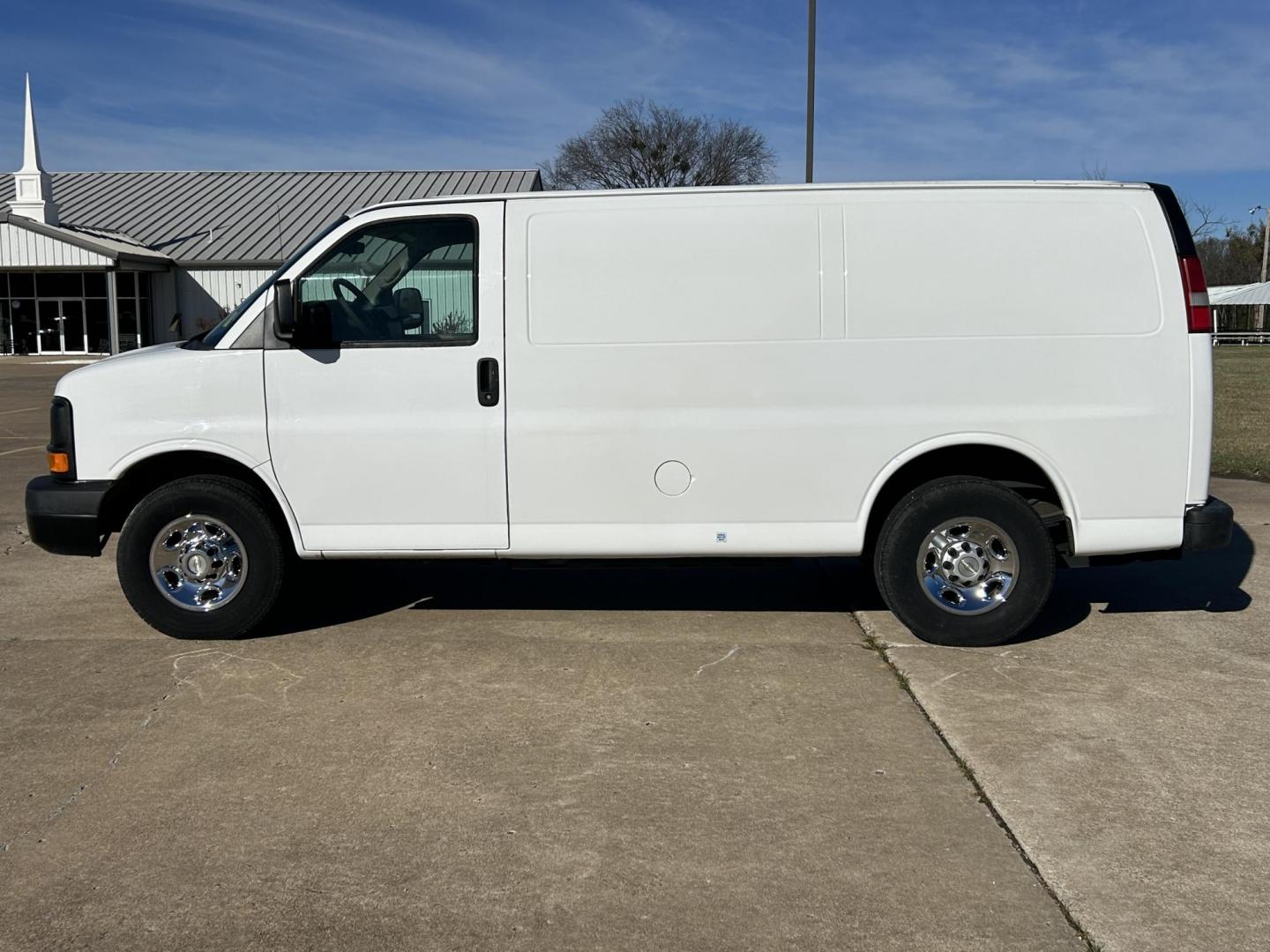 2014 White /BLACK Chevrolet Express 2500 Cargo (1GCWGFCB8E1) with an 6.0L V8 OHV 16V CNG engine, 6A transmission, located at 17760 Hwy 62, Morris, OK, 74445, (918) 733-4887, 35.609104, -95.877060 - 2014 CHEVROLET EXPRESS CARGO VAN 6.0L V8 RWD FEATURING POWER LOCKS, POWER WINDOWS, POWER MIRRORS, MANUAL SEATS, AM/FM STEREO, LEATHER SEATS, TRACTION CONTROL, SPLIT SWING-OUT RIGHT DOORS AND REAR DOORS, TRAILER HITCH AND TOW PACKAGE. EQUIPPED WITH A CNG FUEL SYSTEM THAT RUNS ON COMPRESSED NATURAL GA - Photo#7