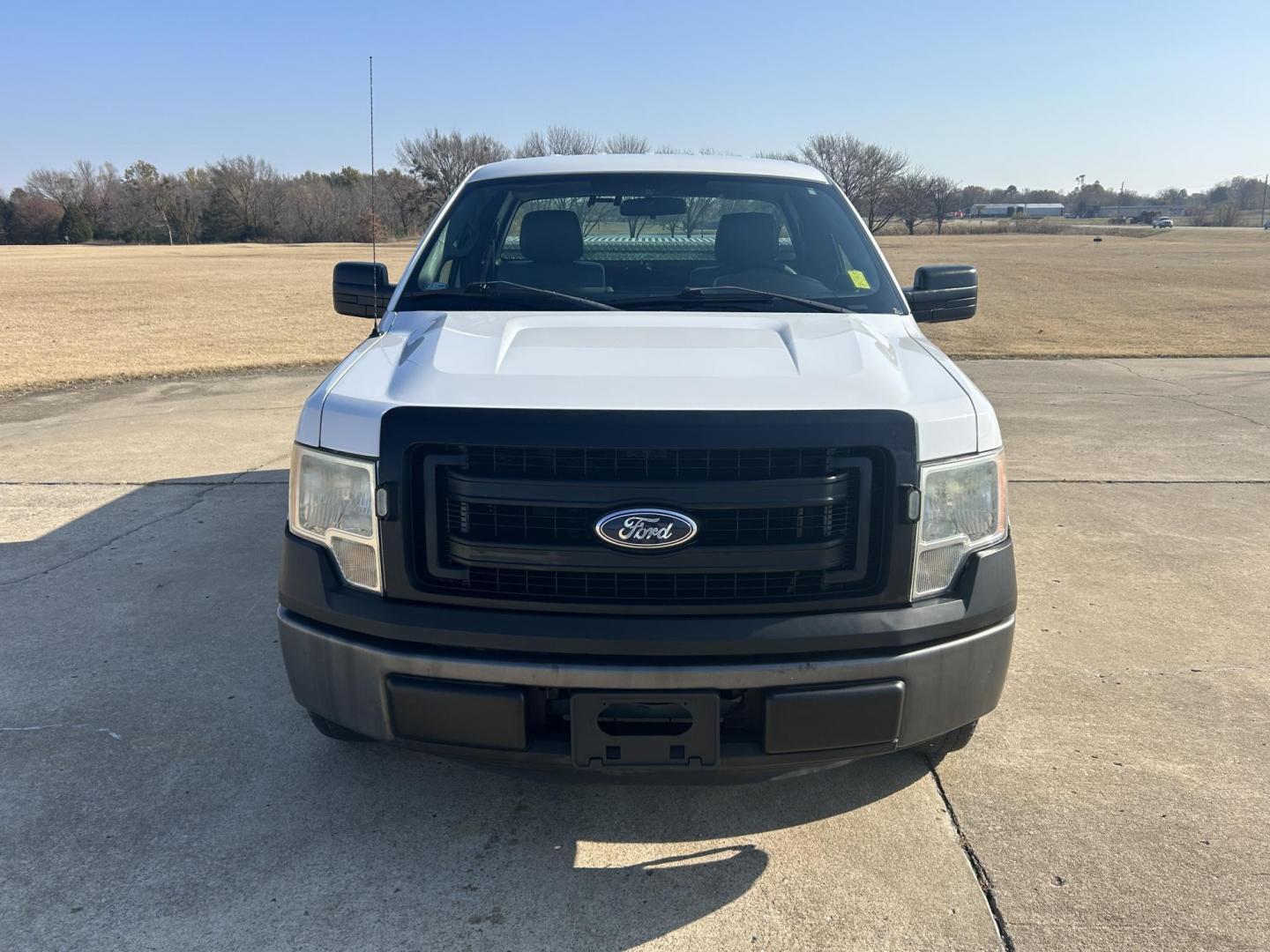 2014 White /Gray Ford F-150 STX 6.5-ft. Bed 2WD (1FTMF1CM8EK) with an 3.7L V6 DOHC 24V engine, 6-Speed Automatic transmission, located at 17760 Hwy 62, Morris, OK, 74445, (918) 733-4887, 35.609104, -95.877060 - 2014 FORD F-150 XL 6.5-ft. BED HAS A 3.7L V6 ENGINGE, 2WD BI-FUEL (RUNS ON BOTH CNG OR GASOLINE) FEATURES MANUAL WINDOWS, MANUAL LOCKS, MANUAL MIRRORS, AM/FM STEREO, LEATHER INTERIOR, CRUISE CONTROL, TRACTION CONTROL, TRACTION CONTROL. IT RUNS ON CNG (COMPRESSED NATURAL GAS) OR GASOLINE. A PREMIER A - Photo#2