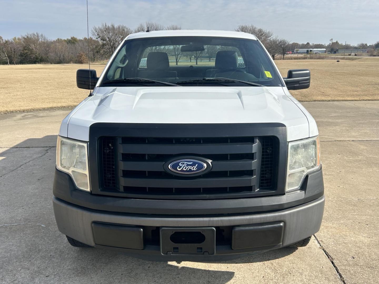 2011 White /Gray Ford F-150 STX 6.5-ft. Bed 2WD (1FTPF1CF4BK) with an 5.0L V8 OHV 16V engine, 4-Speed Automatic transmission, located at 17760 Hwy 62, Morris, OK, 74445, (918) 733-4887, 35.609104, -95.877060 - 2011 FORD F-150 HAS THE 5.0L V8 AND IS RWD. FEATURES POWER LOCKS, POWER WINDOWS, POWER MIRRORS, AM/FM STEREO, CLOTH INTERIOR, BED LINER, CRUISE CONTROL, TRACTION CONTROL, MULTI-FUNCTION STEERING CONTROL. A PREMIER ALTERNATIVE FUEL CONVERSION THAT IS EPA-APPROVED. EXTREMELY CLEAN-BURNING AND EFFICIEN - Photo#2