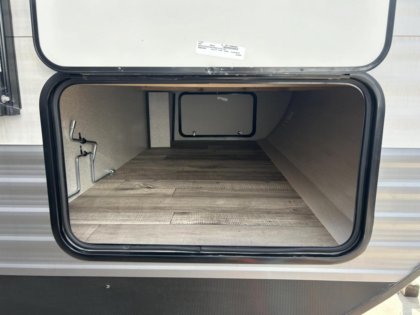 2023 Silver /TAN KZ SPORTSMAN 301BHKSE (4EZTU3020P5) , located at 17760 Hwy 62, Morris, OK, 74445, 35.609104, -95.877060 - HERE IS THE RIGHT CAMPER FOR YOU AND YOUR FAMILY. A 2023 SPORTSMAN KZ 33FT OVERALL (NEVER USED) WITH A 16FT POWER AWNING. IN THE FRONT OF THE CAMPER IS THE MASTER BEDROOM WITH QUEEN SIZE BED, OVERHEAD SHELF, AND 2 WARDROBE CLOSETS. IN THE LIVING/KITCHEN AREA YOU HAVE AN ENTERTAMENT CENTER WITH SOUND - Photo#10