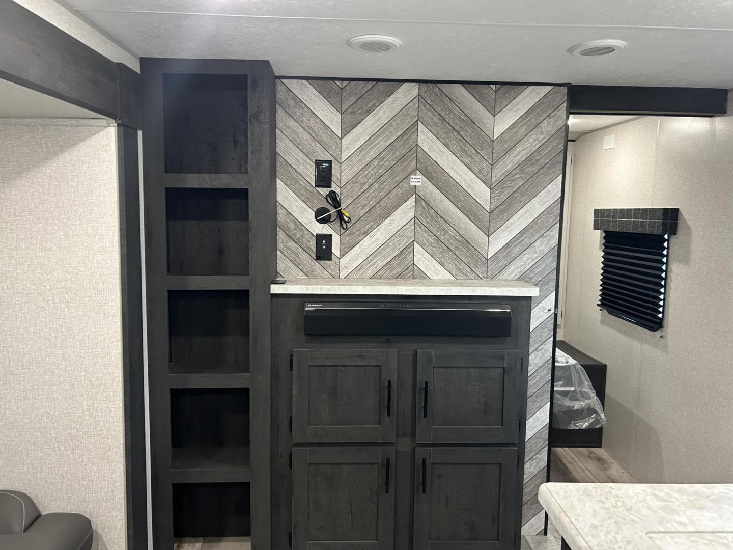 2023 Silver /TAN KZ SPORTSMAN 301BHKSE (4EZTU3020P5) , located at 17760 Hwy 62, Morris, OK, 74445, 35.609104, -95.877060 - HERE IS THE RIGHT CAMPER FOR YOU AND YOUR FAMILY. A 2023 SPORTSMAN KZ 33FT OVERALL (NEVER USED) WITH A 16FT POWER AWNING. IN THE FRONT OF THE CAMPER IS THE MASTER BEDROOM WITH QUEEN SIZE BED, OVERHEAD SHELF, AND 2 WARDROBE CLOSETS. IN THE LIVING/KITCHEN AREA YOU HAVE AN ENTERTAMENT CENTER WITH SOUND - Photo#23