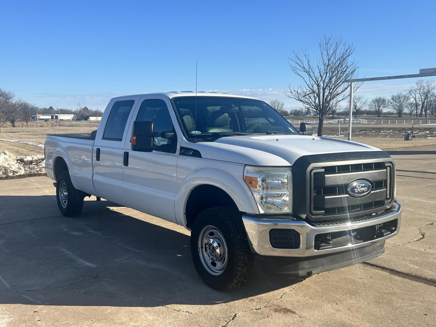 2013 White /Gray Ford F-250 SD SUPER DUTY (1FT7W2B65DE) with an 6.2L V8 OHV 16V engine, 6-Speed Automatic transmission, located at 17760 Hwy 62, Morris, OK, 74445, (918) 733-4887, 35.609104, -95.877060 - 2013 FORD F250 SUPER DUTY 4WD WITH THE 6.2L ENGINE BI-FUEL SYSTEM RUNS ON CNG OR GASOLINE. FEATURES LEATHER INTERIOR, POWER LOCKS, POWER WINDOWS, POWER MIRRORS, CRUISE CONTROL, TRACTION CONTROL, AUXILIARY PORT, AM/FM RADIO, CD PLAYER , A/C, BEDLINER, AND HITCH. THIS TRUCK RUNS ON CNG (COMPRESSED NA - Photo#1