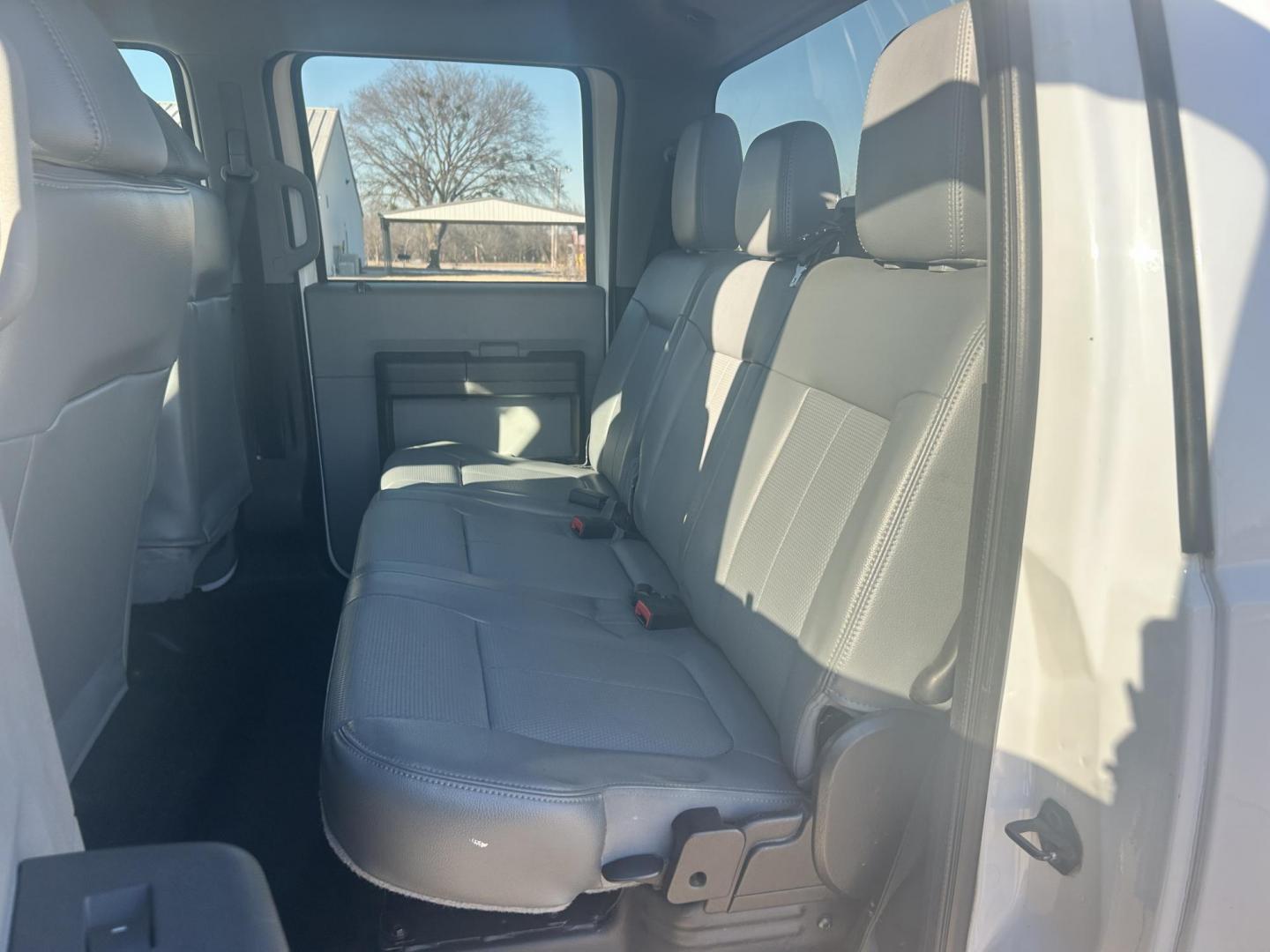 2013 White /Gray Ford F-250 SD SUPER DUTY (1FT7W2B65DE) with an 6.2L V8 OHV 16V engine, 6-Speed Automatic transmission, located at 17760 Hwy 62, Morris, OK, 74445, (918) 733-4887, 35.609104, -95.877060 - 2013 FORD F250 SUPER DUTY 4WD WITH THE 6.2L ENGINE BI-FUEL SYSTEM RUNS ON CNG OR GASOLINE. FEATURES LEATHER INTERIOR, POWER LOCKS, POWER WINDOWS, POWER MIRRORS, CRUISE CONTROL, TRACTION CONTROL, AUXILIARY PORT, AM/FM RADIO, CD PLAYER , A/C, BEDLINER, AND HITCH. THIS TRUCK RUNS ON CNG (COMPRESSED NA - Photo#13