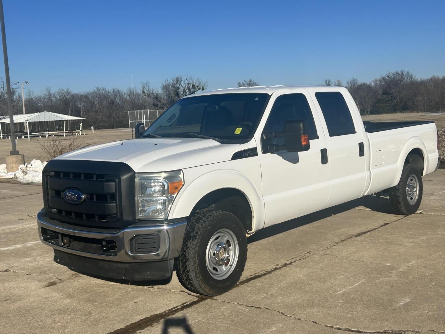 2013 White /Gray Ford F-250 SD SUPER DUTY (1FT7W2B65DE) with an 6.2L V8 OHV 16V engine, 6-Speed Automatic transmission, located at 17760 Hwy 62, Morris, OK, 74445, (918) 733-4887, 35.609104, -95.877060 - 2013 FORD F250 SUPER DUTY 4WD WITH THE 6.2L ENGINE BI-FUEL SYSTEM RUNS ON CNG OR GASOLINE. FEATURES LEATHER INTERIOR, POWER LOCKS, POWER WINDOWS, POWER MIRRORS, CRUISE CONTROL, TRACTION CONTROL, AUXILIARY PORT, AM/FM RADIO, CD PLAYER , A/C, BEDLINER, AND HITCH. THIS TRUCK RUNS ON CNG (COMPRESSED NA - Photo#2