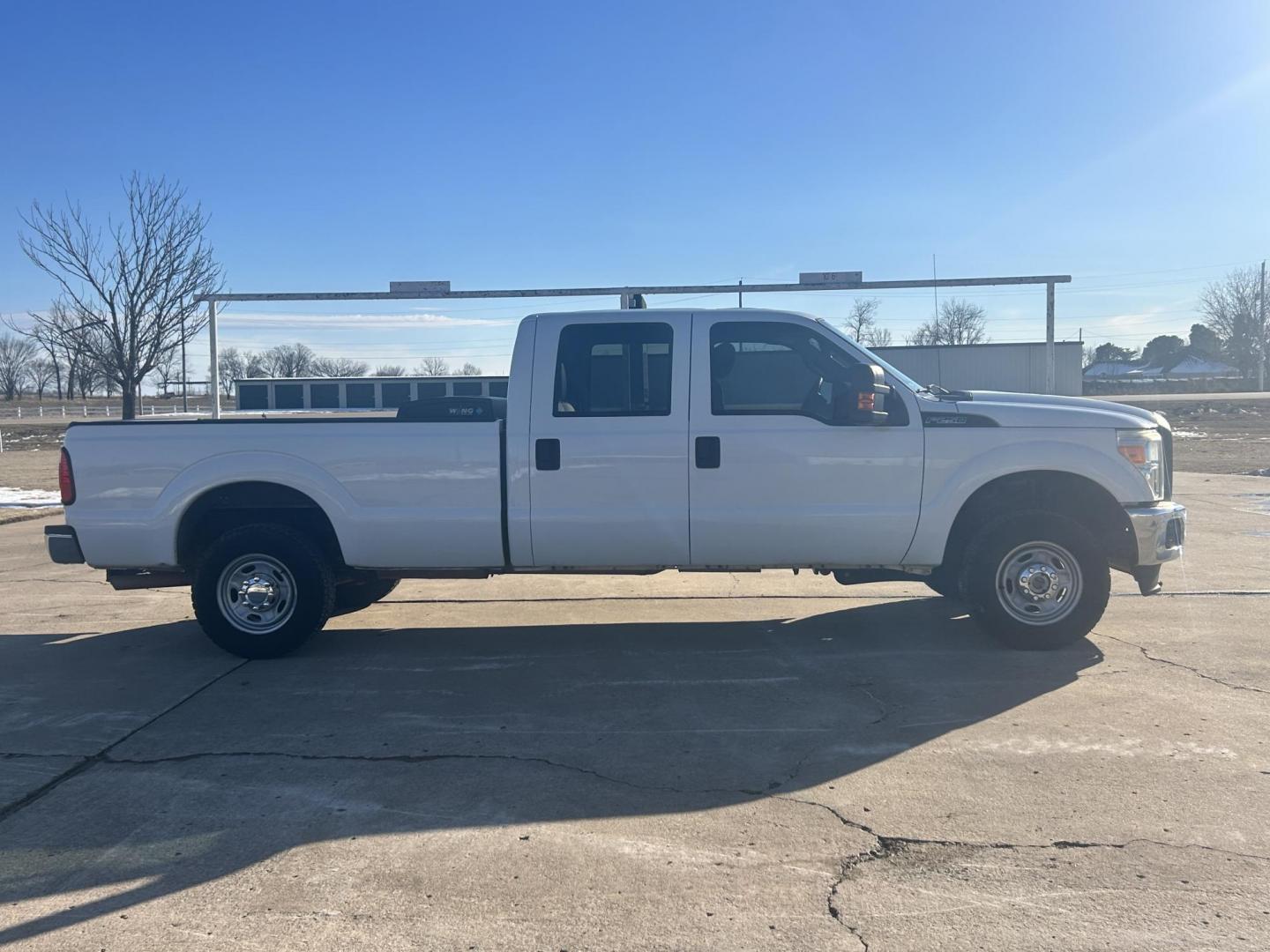 2013 White /Gray Ford F-250 SD SUPER DUTY (1FT7W2B65DE) with an 6.2L V8 OHV 16V engine, 6-Speed Automatic transmission, located at 17760 Hwy 62, Morris, OK, 74445, (918) 733-4887, 35.609104, -95.877060 - 2013 FORD F250 SUPER DUTY 4WD WITH THE 6.2L ENGINE BI-FUEL SYSTEM RUNS ON CNG OR GASOLINE. FEATURES LEATHER INTERIOR, POWER LOCKS, POWER WINDOWS, POWER MIRRORS, CRUISE CONTROL, TRACTION CONTROL, AUXILIARY PORT, AM/FM RADIO, CD PLAYER , A/C, BEDLINER, AND HITCH. THIS TRUCK RUNS ON CNG (COMPRESSED NA - Photo#3