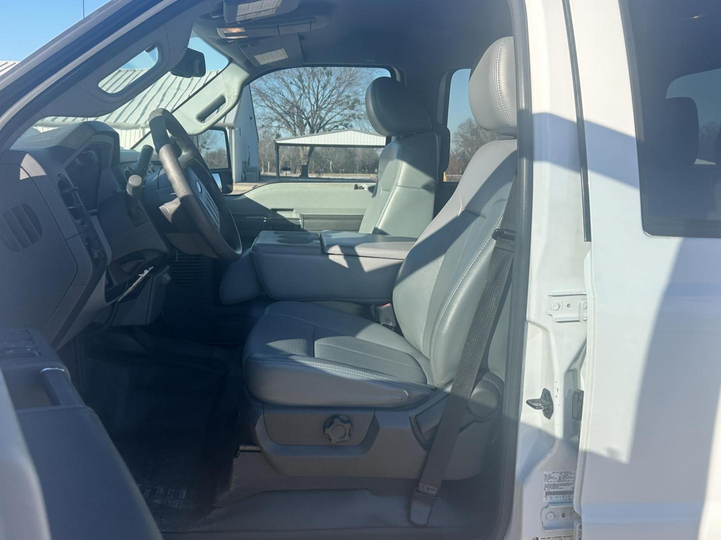 2013 White /Gray Ford F-250 SD SUPER DUTY (1FT7W2B65DE) with an 6.2L V8 OHV 16V engine, 6-Speed Automatic transmission, located at 17760 Hwy 62, Morris, OK, 74445, (918) 733-4887, 35.609104, -95.877060 - 2013 FORD F250 SUPER DUTY 4WD WITH THE 6.2L ENGINE BI-FUEL SYSTEM RUNS ON CNG OR GASOLINE. FEATURES LEATHER INTERIOR, POWER LOCKS, POWER WINDOWS, POWER MIRRORS, CRUISE CONTROL, TRACTION CONTROL, AUXILIARY PORT, AM/FM RADIO, CD PLAYER , A/C, BEDLINER, AND HITCH. THIS TRUCK RUNS ON CNG (COMPRESSED NA - Photo#7