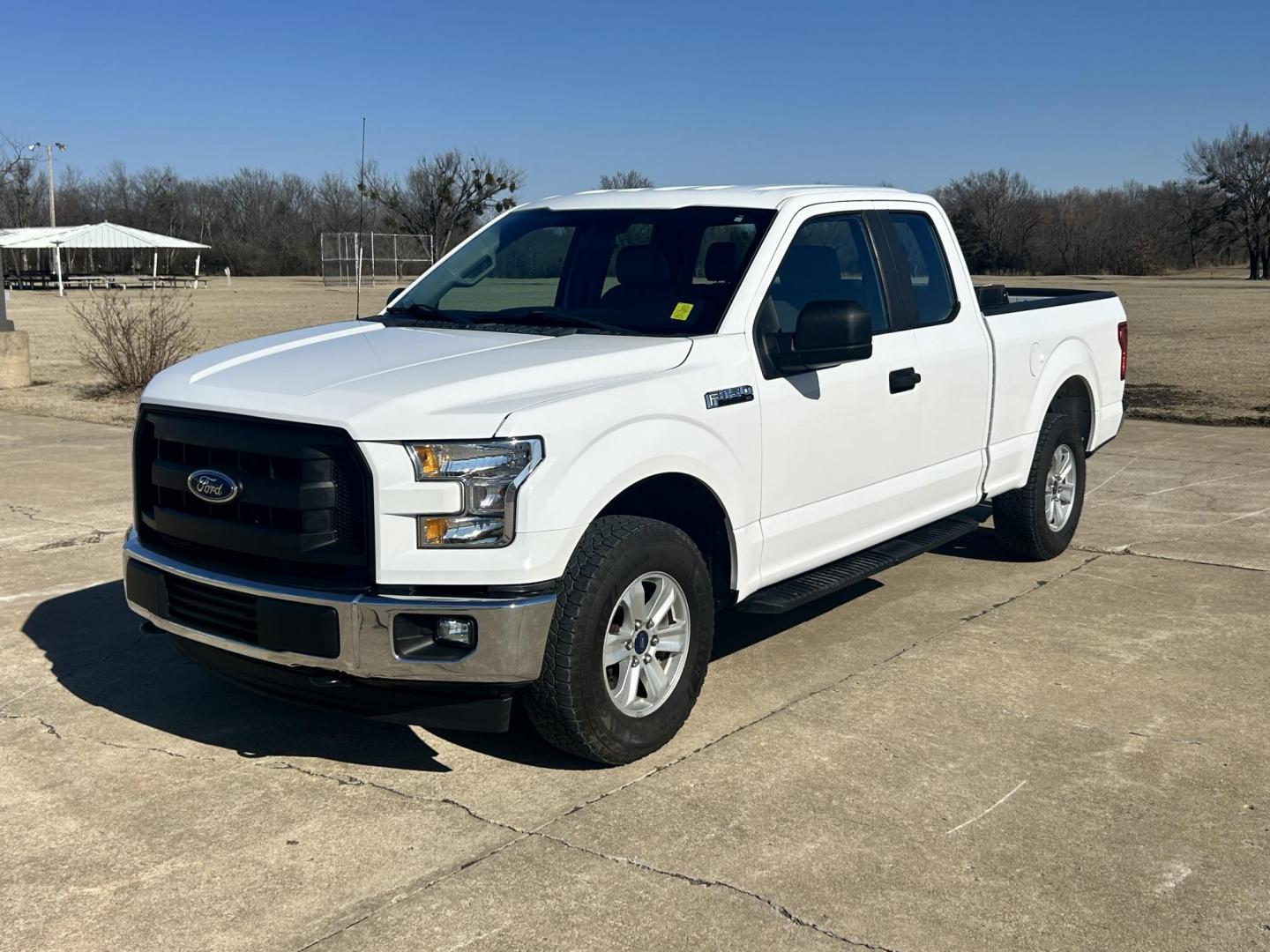 2017 White /Gray Ford F-150 SuperCab . 4WD (1FTFX1EF5HK) with an 5.0L V8 engine, 6A transmission, located at 17760 Hwy 62, Morris, OK, 74445, (918) 733-4887, 35.609104, -95.877060 - 2017 FORD F150 SUPER DUTY 4WD WITH THE 5.0L ENGINE BI-FUEL SYSTEM RUNS ON CNG OR GASOLINE. FEATURES LEATHER INTERIOR, POWER LOCKS, POWER WINDOWS, POWER MIRRORS, CRUISE CONTROL, TRACTION CONTROL, AUXILIARY PORT, AM/FM RADIO, CD PLAYER , A/C, BEDLINER, AND HITCH. THIS TRUCK RUNS ON CNG (COMPRESSED NAT - Photo#0