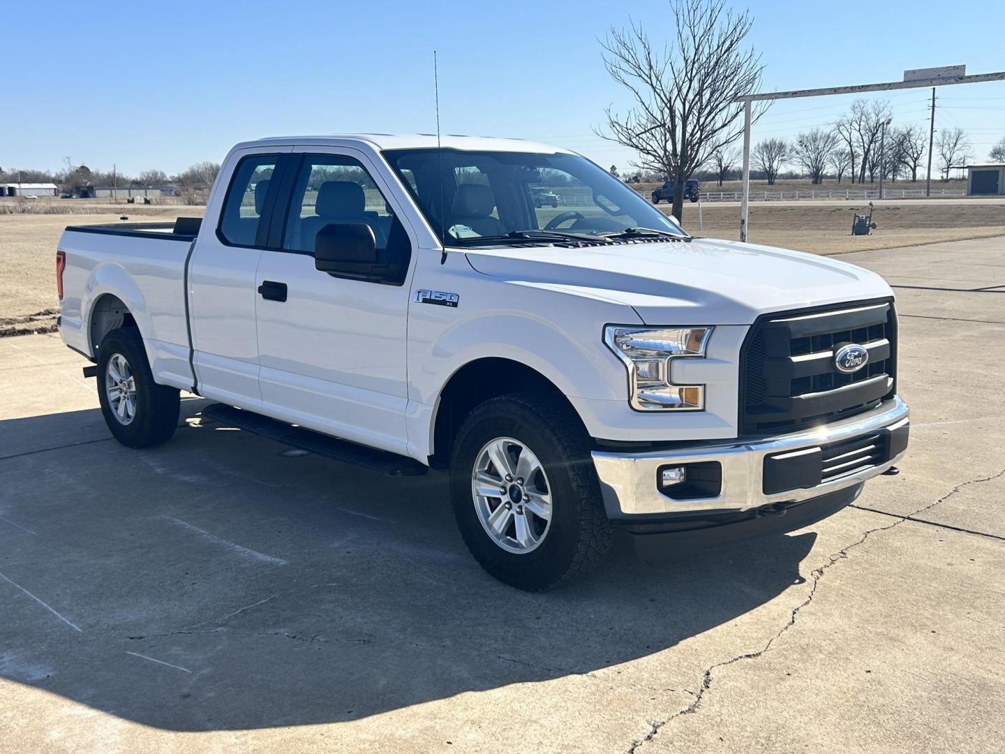 2017 White /Gray Ford F-150 SuperCab . 4WD (1FTFX1EF5HK) with an 5.0L V8 engine, 6A transmission, located at 17760 Hwy 62, Morris, OK, 74445, (918) 733-4887, 35.609104, -95.877060 - 2017 FORD F150 SUPER DUTY 4WD WITH THE 5.0L ENGINE BI-FUEL SYSTEM RUNS ON CNG OR GASOLINE. FEATURES LEATHER INTERIOR, POWER LOCKS, POWER WINDOWS, POWER MIRRORS, CRUISE CONTROL, TRACTION CONTROL, AUXILIARY PORT, AM/FM RADIO, CD PLAYER , A/C, BEDLINER, AND HITCH. THIS TRUCK RUNS ON CNG (COMPRESSED NAT - Photo#2