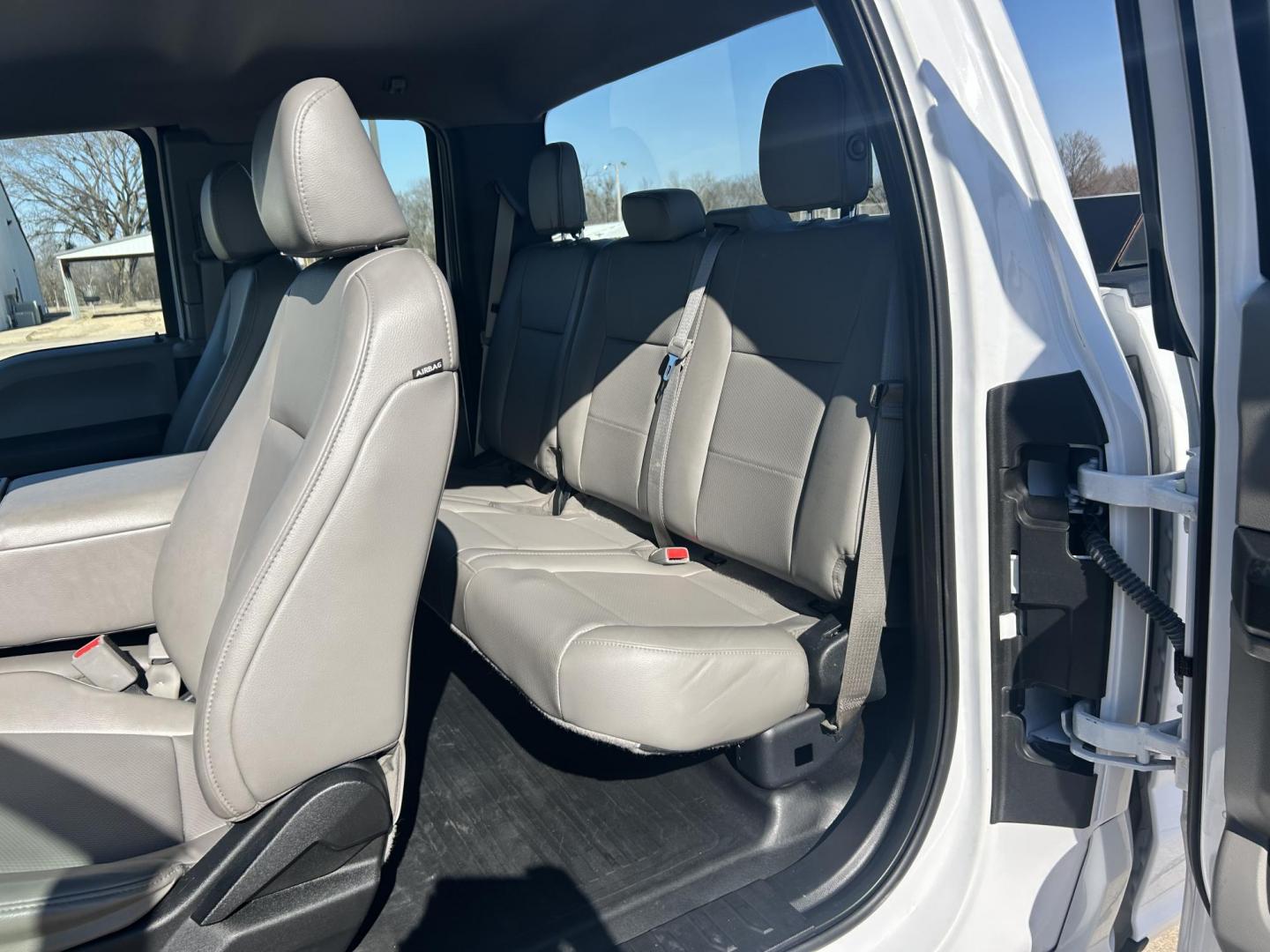 2017 White /Gray Ford F-150 SuperCab . 4WD (1FTFX1EF5HK) with an 5.0L V8 engine, 6A transmission, located at 17760 Hwy 62, Morris, OK, 74445, (918) 733-4887, 35.609104, -95.877060 - 2017 FORD F150 SUPER DUTY 4WD WITH THE 5.0L ENGINE BI-FUEL SYSTEM RUNS ON CNG OR GASOLINE. FEATURES LEATHER INTERIOR, POWER LOCKS, POWER WINDOWS, POWER MIRRORS, CRUISE CONTROL, TRACTION CONTROL, AUXILIARY PORT, AM/FM RADIO, CD PLAYER , A/C, BEDLINER, AND HITCH. THIS TRUCK RUNS ON CNG (COMPRESSED NAT - Photo#16