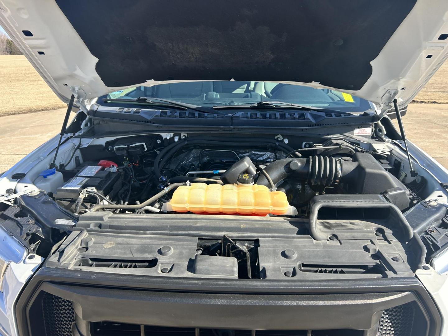 2017 White /Gray Ford F-150 SuperCab . 4WD (1FTFX1EF5HK) with an 5.0L V8 engine, 6A transmission, located at 17760 Hwy 62, Morris, OK, 74445, (918) 733-4887, 35.609104, -95.877060 - 2017 FORD F150 SUPER DUTY 4WD WITH THE 5.0L ENGINE BI-FUEL SYSTEM RUNS ON CNG OR GASOLINE. FEATURES LEATHER INTERIOR, POWER LOCKS, POWER WINDOWS, POWER MIRRORS, CRUISE CONTROL, TRACTION CONTROL, AUXILIARY PORT, AM/FM RADIO, CD PLAYER , A/C, BEDLINER, AND HITCH. THIS TRUCK RUNS ON CNG (COMPRESSED NAT - Photo#19