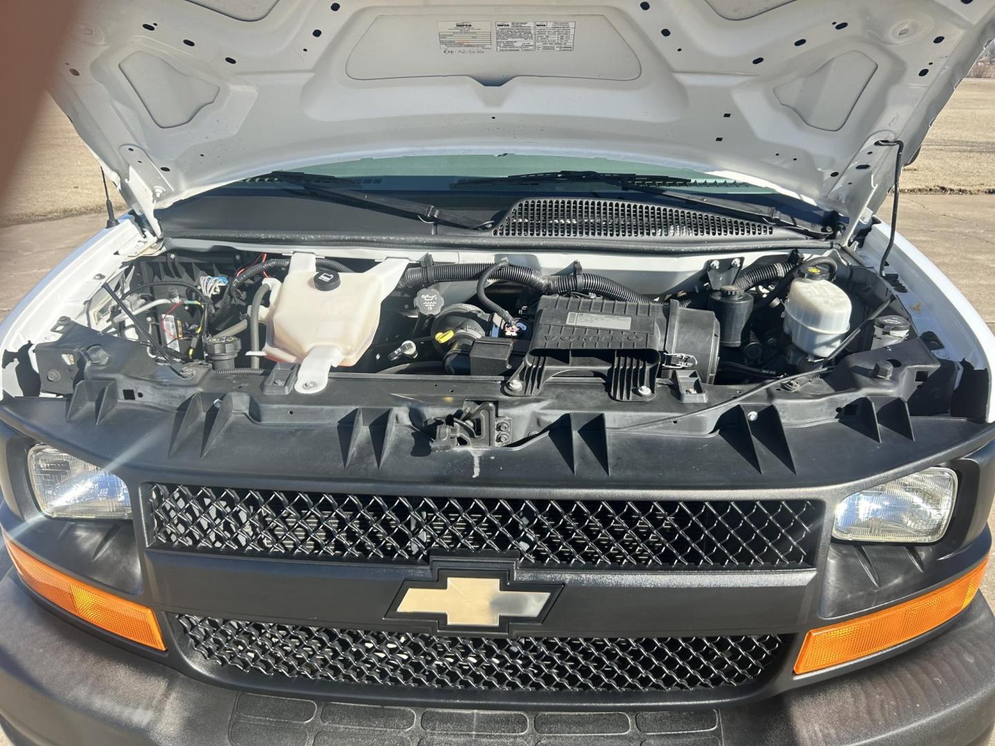 2012 White /Gray Chevrolet Express 3500 Cargo (1GCZGTCBXC1) with an 3.6L V6 DOHC 16V engine, 6-Speed Automatic transmission, located at 17760 Hwy 62, Morris, OK, 74445, (918) 733-4887, 35.609104, -95.877060 - 2012 CHEVROLET EXPRESS CARGO VAN 6.0L V8 RWD FEATURING MANUAL LOCKS, MANUAL WINDOWS, MANUAL MIRRORS, MANUAL SEATS, AM/FM STEREO, LEATHER SEATS, LEATHER-WRAPPED STEERING WHEEL, TRACTION CONTROL, SPLIT SWING-OUT RIGHT DOORS, AND TOW PACKAGE. EQUIPPED WITH IMPCO CNG FUEL SYSTEM THAT RUNS ON COMPRESSED - Photo#16