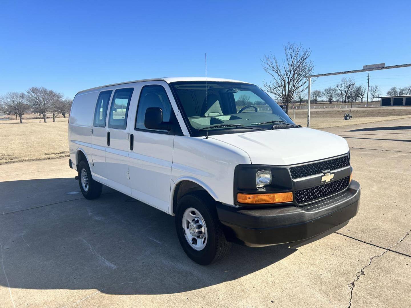 2012 White /Gray Chevrolet Express 3500 Cargo (1GCZGTCBXC1) with an 3.6L V6 DOHC 16V engine, 6-Speed Automatic transmission, located at 17760 Hwy 62, Morris, OK, 74445, (918) 733-4887, 35.609104, -95.877060 - 2012 CHEVROLET EXPRESS CARGO VAN 6.0L V8 RWD FEATURING MANUAL LOCKS, MANUAL WINDOWS, MANUAL MIRRORS, MANUAL SEATS, AM/FM STEREO, LEATHER SEATS, LEATHER-WRAPPED STEERING WHEEL, TRACTION CONTROL, SPLIT SWING-OUT RIGHT DOORS, AND TOW PACKAGE. EQUIPPED WITH IMPCO CNG FUEL SYSTEM THAT RUNS ON COMPRESSED - Photo#2