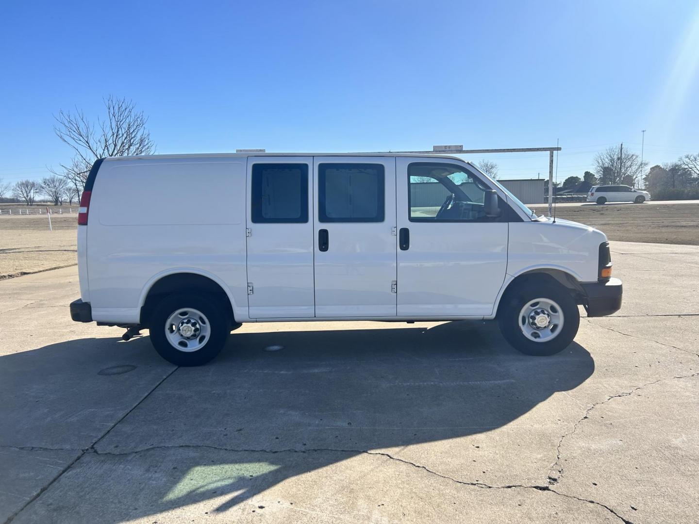 2012 White /Gray Chevrolet Express 3500 Cargo (1GCZGTCBXC1) with an 3.6L V6 DOHC 16V engine, 6-Speed Automatic transmission, located at 17760 Hwy 62, Morris, OK, 74445, (918) 733-4887, 35.609104, -95.877060 - 2012 CHEVROLET EXPRESS CARGO VAN 6.0L V8 RWD FEATURING MANUAL LOCKS, MANUAL WINDOWS, MANUAL MIRRORS, MANUAL SEATS, AM/FM STEREO, LEATHER SEATS, LEATHER-WRAPPED STEERING WHEEL, TRACTION CONTROL, SPLIT SWING-OUT RIGHT DOORS, AND TOW PACKAGE. EQUIPPED WITH IMPCO CNG FUEL SYSTEM THAT RUNS ON COMPRESSED - Photo#3