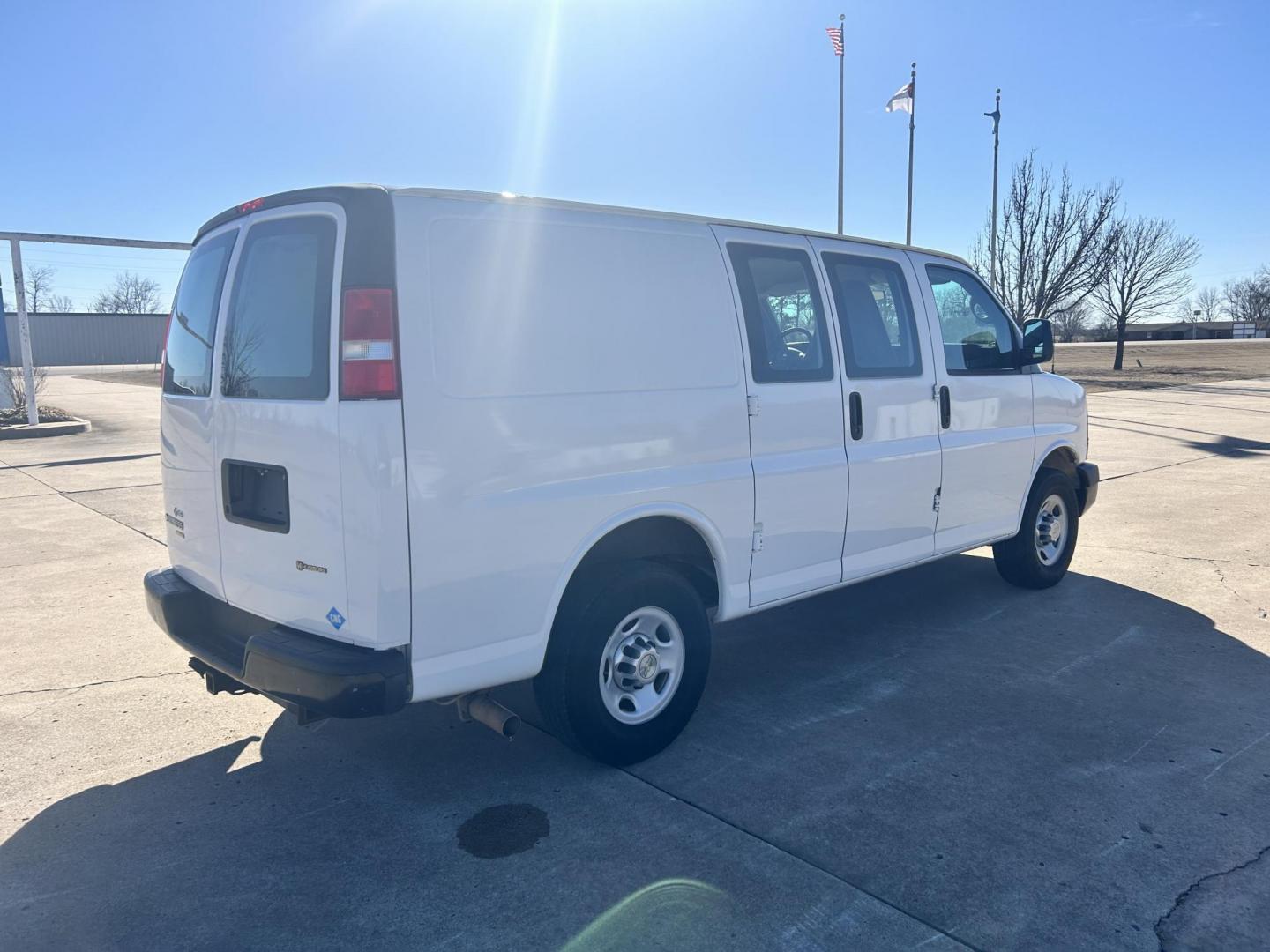 2012 White /Gray Chevrolet Express 3500 Cargo (1GCZGTCBXC1) with an 3.6L V6 DOHC 16V engine, 6-Speed Automatic transmission, located at 17760 Hwy 62, Morris, OK, 74445, (918) 733-4887, 35.609104, -95.877060 - 2012 CHEVROLET EXPRESS CARGO VAN 6.0L V8 RWD FEATURING MANUAL LOCKS, MANUAL WINDOWS, MANUAL MIRRORS, MANUAL SEATS, AM/FM STEREO, LEATHER SEATS, LEATHER-WRAPPED STEERING WHEEL, TRACTION CONTROL, SPLIT SWING-OUT RIGHT DOORS, AND TOW PACKAGE. EQUIPPED WITH IMPCO CNG FUEL SYSTEM THAT RUNS ON COMPRESSED - Photo#4