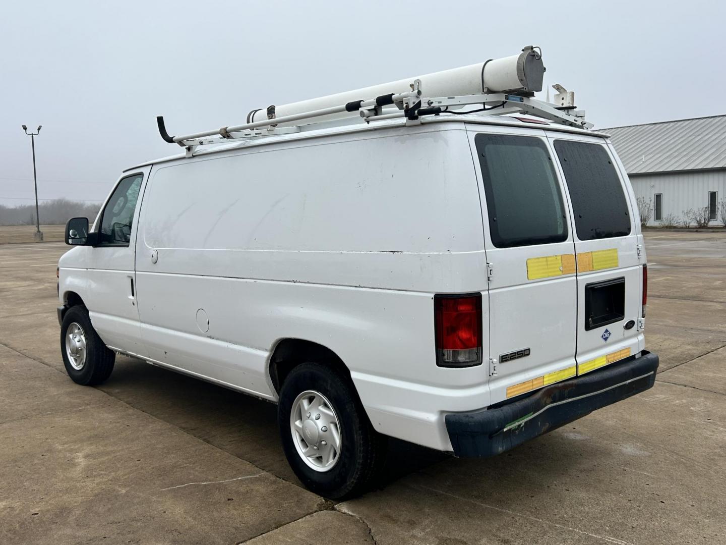 2010 White /Gray Ford E-Series Van E-250 (1FTNE2EL1AD) with an 5.4L V8 SOHC 16V engine, 4-Speed Automatic transmission, located at 17760 Hwy 62, Morris, OK, 74445, (918) 733-4887, 35.609104, -95.877060 - 2010 FORD E-SERIES VAN E-250 5.4 V8 DEDICATED CNG (COMPRESSED NATURAL GAS) DOES NOT RUN ON GASOLINE. FEATURES MANUAL SEATS, MANUAL LOCKS, MANUAL WINDOWS, MANUAL MIRRORS, AM/FM STEREO. IT IS EQUIPPED WITH A CNG FUELING SYSTEM, IT RUNS ON COMPRESSED NATURAL GAS. A PREMIER ALTERNATIVE FUEL THAT IS EXTR - Photo#6