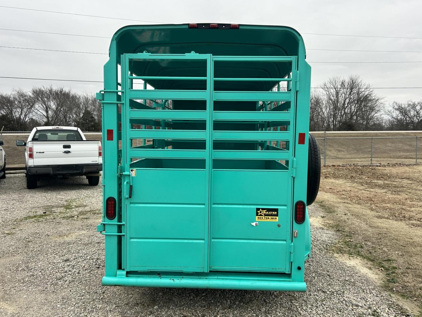 2024 TURQUOISE GOODGUYS RANCHER SERIES (7TTBL1420ST) , located at 17760 Hwy 62, Morris, OK, 74445, 35.609104, -95.877060 - 2024 GOODGUYS TRAILER 5X14FT RANCHER SERIES BUMPER PULL. FEATURES 34" SOLID SIDES, TUBING SIDE, FULL ESCAPE DOOR, FULL SWING REAR GATE WITH SLIDER, ONE CENTER CUT GATE, BUTTERFLY VENTS, SPARE TIRE MOUNT, (2) 3.5K ELECTRIC BRAKE AXELS. 2 INCH BALL. *** CLEAN TITLE*** $5,900 CALL RUSS, JONA, OR - Photo#5