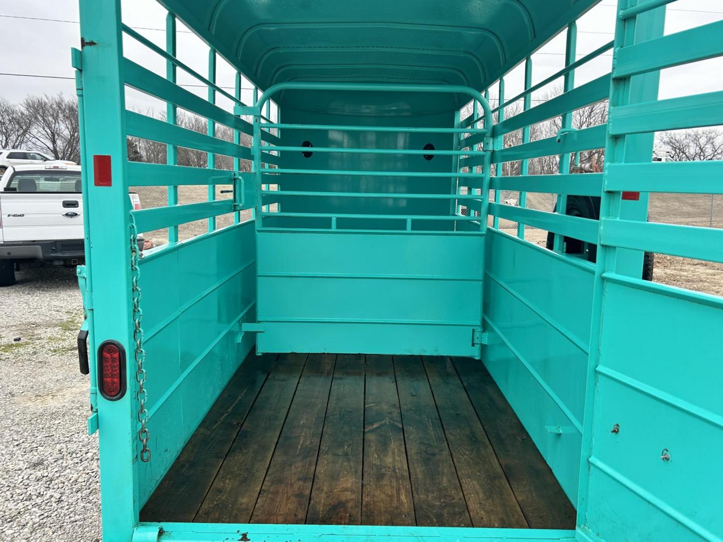 2024 TURQUOISE GOODGUYS RANCHER SERIES (7TTBL1420ST) , located at 17760 Hwy 62, Morris, OK, 74445, 35.609104, -95.877060 - 2024 GOODGUYS TRAILER 5X14FT RANCHER SERIES BUMPER PULL. FEATURES 34" SOLID SIDES, TUBING SIDE, FULL ESCAPE DOOR, FULL SWING REAR GATE WITH SLIDER, ONE CENTER CUT GATE, BUTTERFLY VENTS, SPARE TIRE MOUNT, (2) 3.5K ELECTRIC BRAKE AXELS. 2 INCH BALL. *** CLEAN TITLE*** $5,900 CALL RUSS, JONA, OR - Photo#6