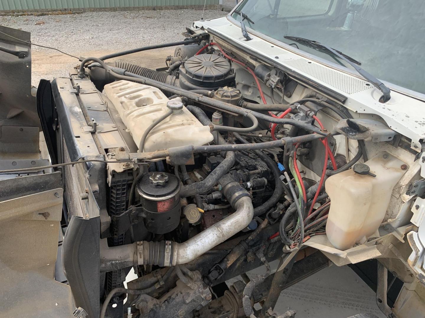 1998 WHITE/BLACK /BLACK Ford DUMP TRUCK (1FDXF80C9WV) , AUTO transmission, located at 17760 Hwy 62, Morris, OK, 74445, (918) 733-4887, 35.609104, -95.877060 - 1998 FORD F800 DUMP TRUCK CUMMINGS IN LINE 6 CYL, FACTORY EQUIPPED DEDICATED CNG, COMPRESSED NATURAL GAS ONLY! IT DOES NOT RUN ON GASOLINE OR DIESEL. FEATURES POWER STEERING, AIR BRAKES, GVWR IS 30,000, BED IS 18 FEET LONG, 8 FEET WIDE, 4 FEET SIDES, ALL STEEL WITH NO DAMAGE OR RUST, APPROX 50 GALL - Photo#9